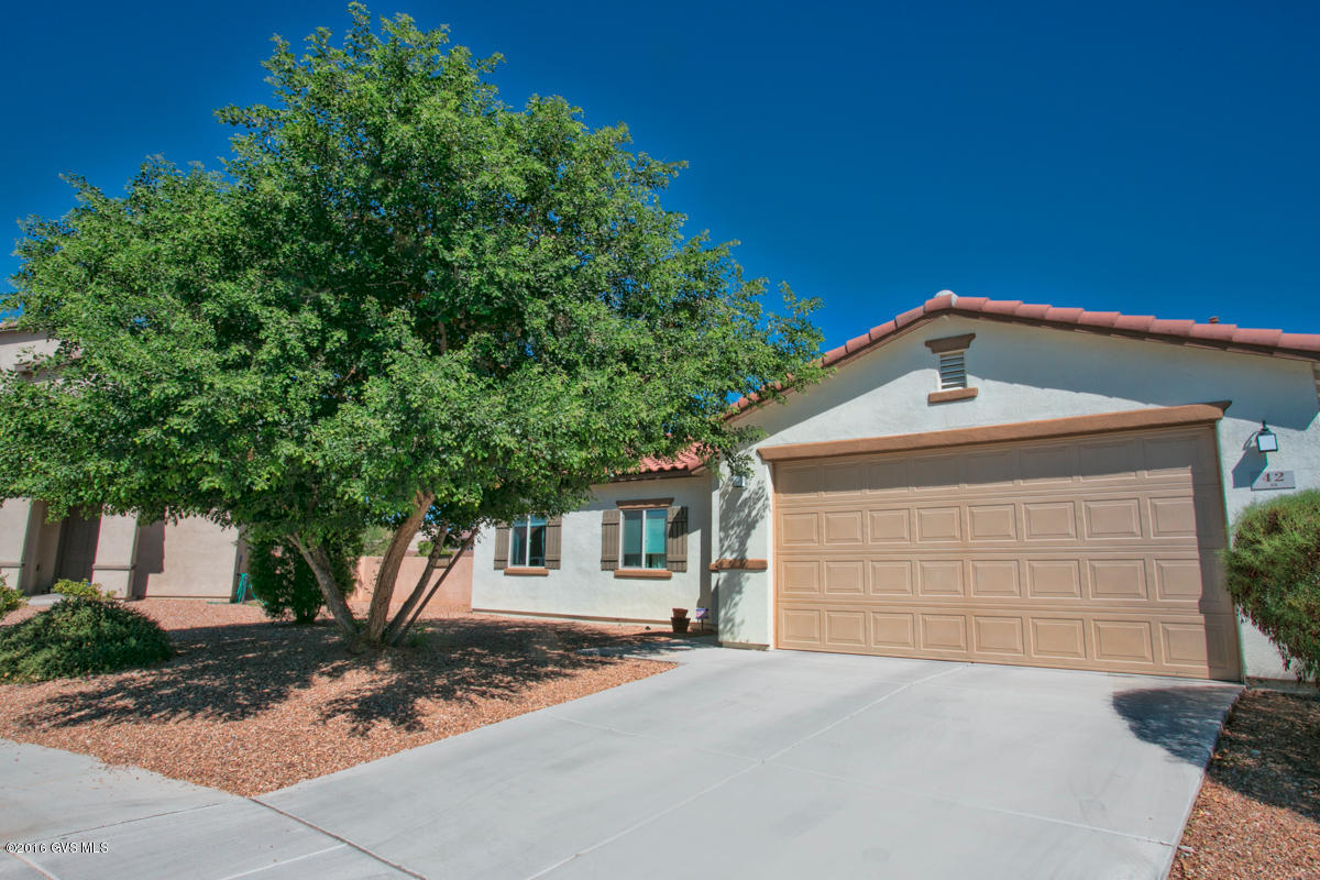 HUGE 12,197sf lot on a private cul-d-sac in Rancho Sahuaria! Check out this GORGEOUS one story home with three bedrooms, two bathrooms plus den! Wood flooring throughout except bedrooms. Expanded maple cabinets in the kitchen. black appliances, gas cooktop range. Cultured marble counters in baths. Master has garden tub/shower combination. All window coverings and ceiling fans included. Alarm system installed and garage door opener. Don't miss out on this one!!!