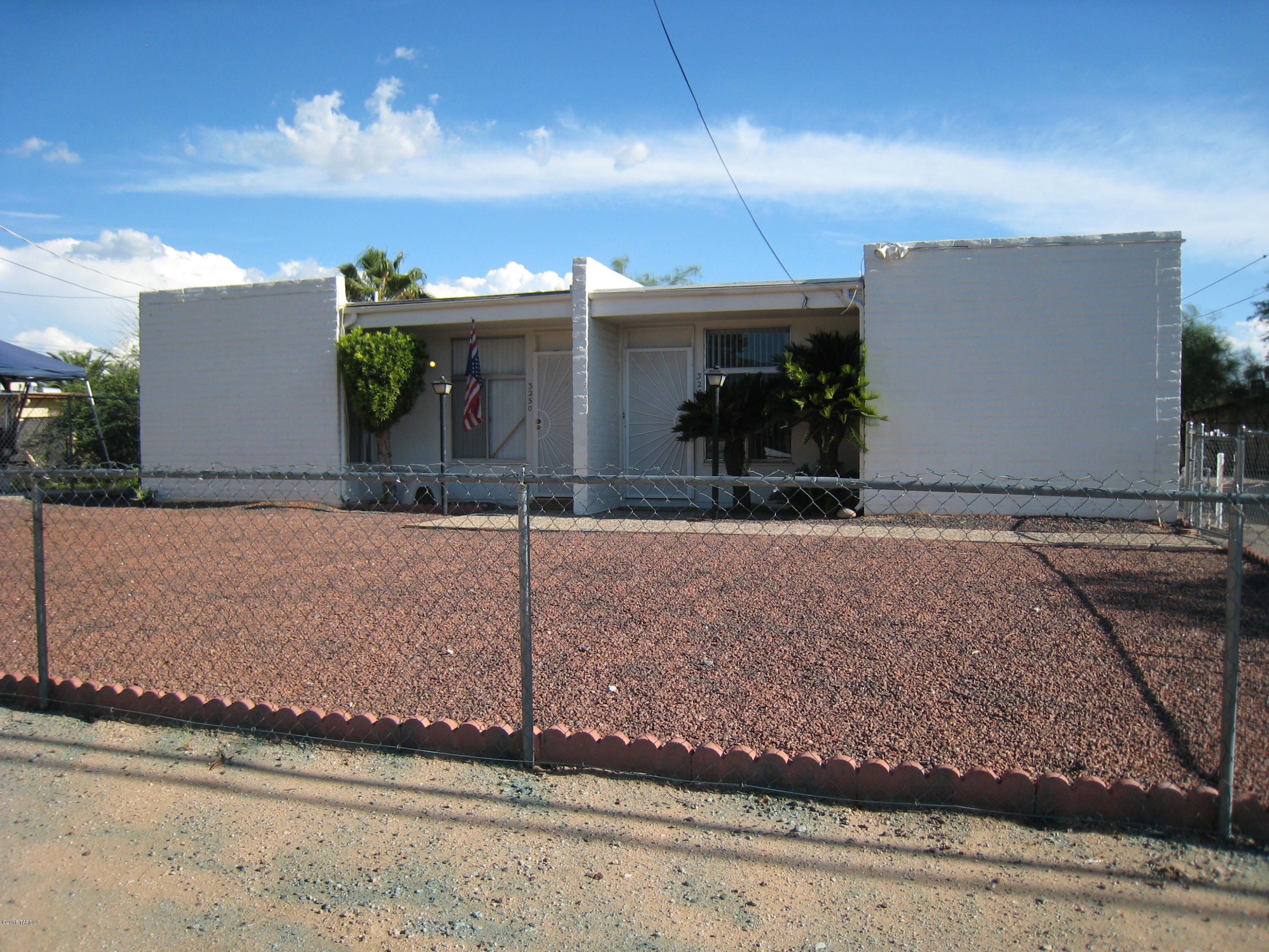 Outstanding DUPLEX ideally located for U/A & PCC Students, Medical Center, or anything Central. Live in one / other provides income. Both 2/2 units have been substantially improved and are in great shape. Covered Parking w/lots of additional on-site parking. Fresh paint, flooring, lighting, and more. Great curb appeal! These units are really sharp with efficient floor plans that don't waste living space. Large Bedrooms! Super Master and Hall baths w/water saver toilets, new hardware-amenities. Kitchens have full-size refrigerator, oven/stove, hood, disposal, and nice counters & faucet-set. New Carpet & Tile in 3248; near-new in 3250. Huge covered private rear patios. Laundry Rooms w/storage. Best listed DUPLEX in the area!  A beneficiary of Seller trust is a licensed AZ Real Estate Broker.