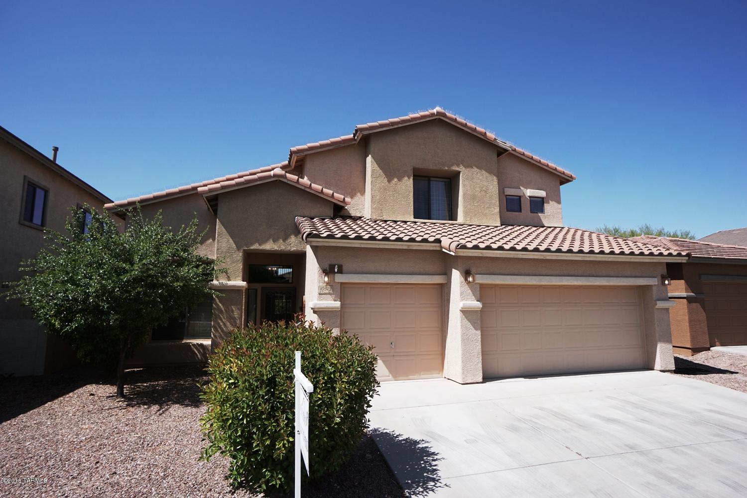 Wonderful Monterey home in Mesquite Ranch.  Huge home -3261 square feet, with 4 bedrooms, 4 baths, loft area and office/ den.  Many upgrades to include custom painting and window treatments, beautiful wrought iron staircase, cathedral ceilings, large Kitchen with new stainless steel appliances.  Lots of storage through the home. Tile and wood flooring, new carpet.  Master bedroom is on the main floor. Lovely backyard with pool, pad for spa and grassy area. 3 car garage with storage. Mesquite Ranch has a community pool, basketball court and jogging path.