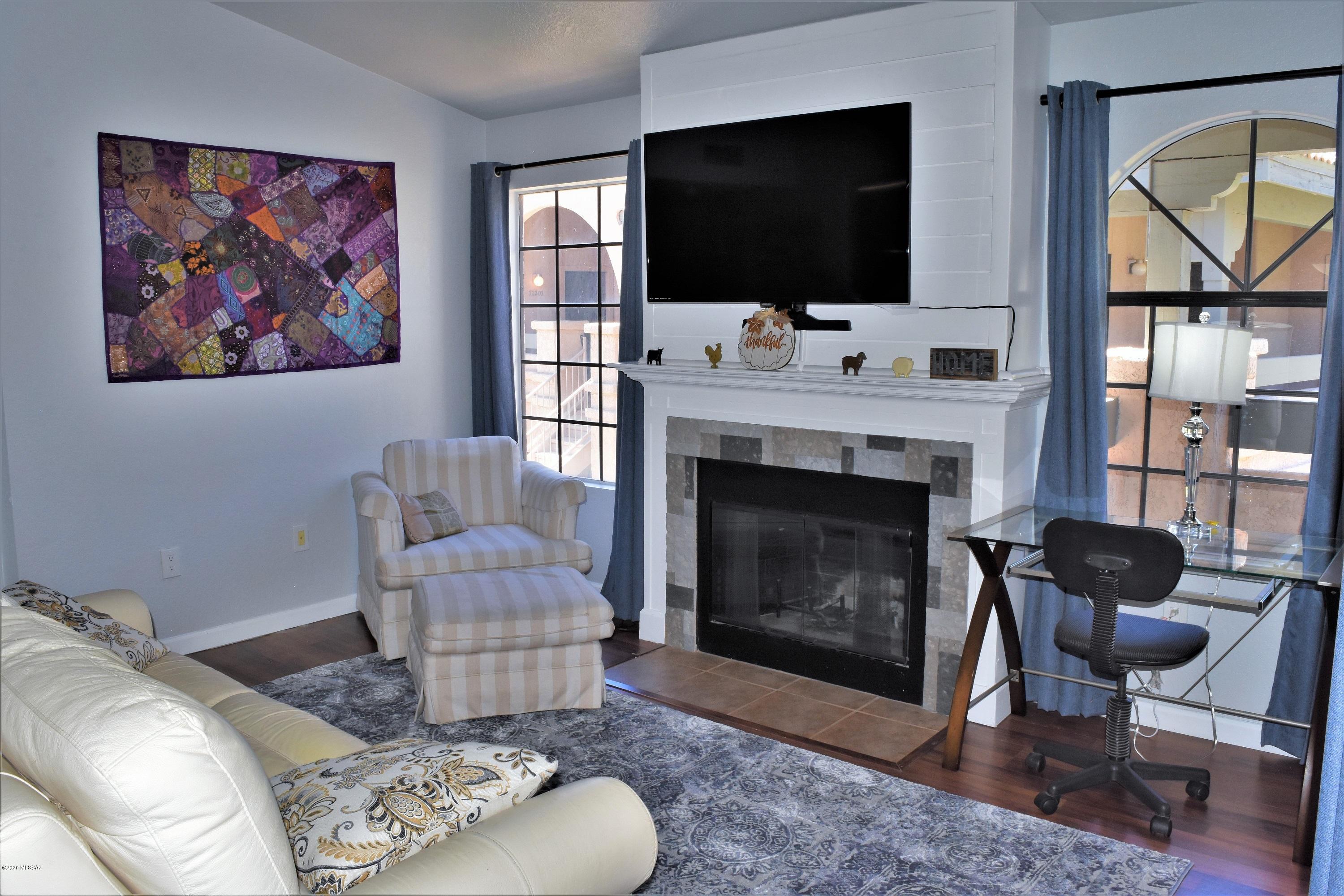 Charming 2-bedroom, 1-bathroom condo located in Moonrise at Starr Pass. Upper level condo with high vaulted ceilings, open, bright floor plan with a relaxing fireplace and balcony. Excellent proximity to the community pool, spa, and clubhouse. Newer AC installed in the unit. HOA covers Water/Trash/Roof and Sewer. Close to Pima Community College, Downtown and amenities. Schedule your showing today! Furniture available on separate bill of sale, please call for details.