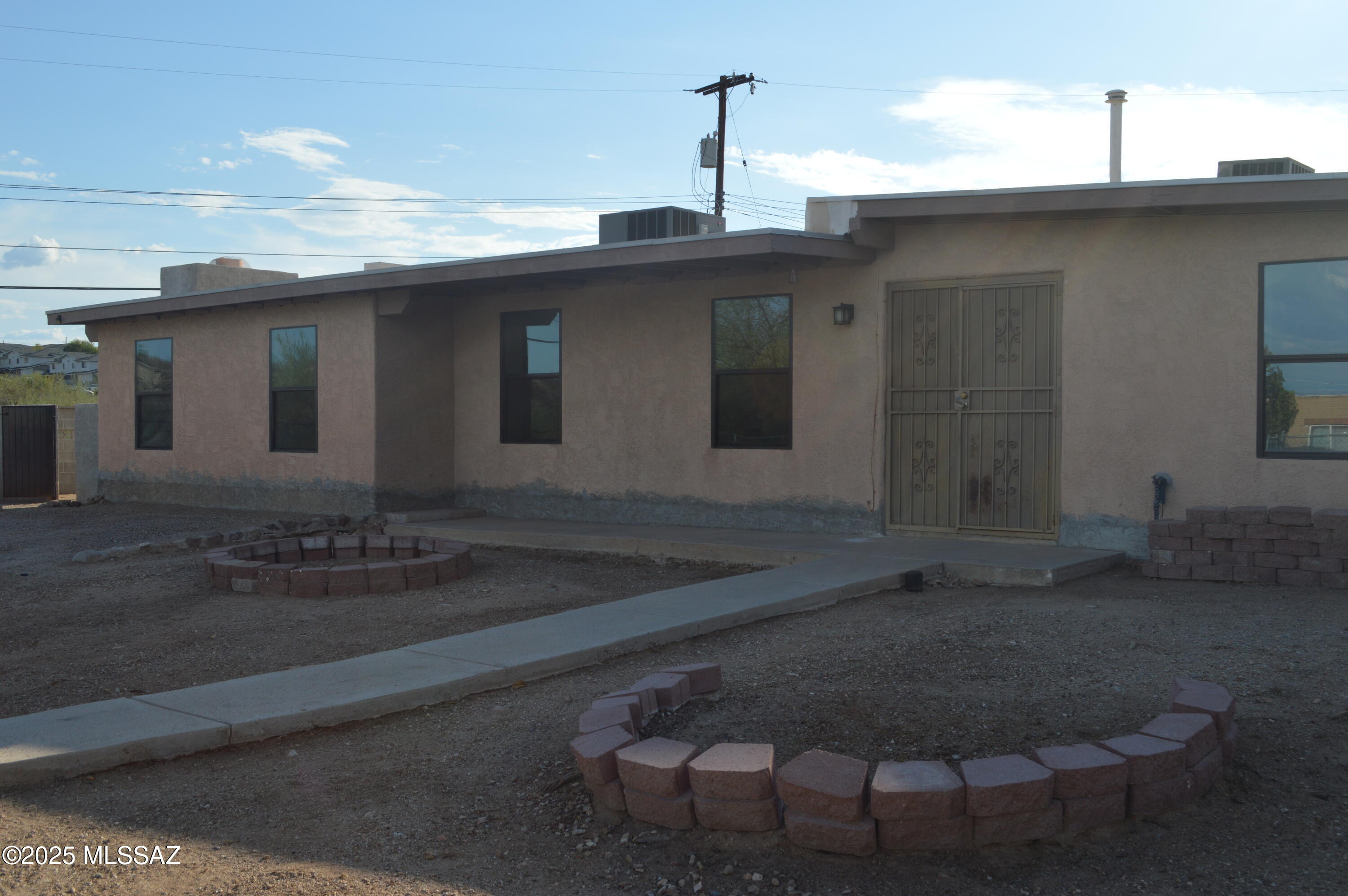 This Westside masonary stucco 2012 sq ft home is priced right, and ready for some TLC to make it shine! Home needs roof repair, fascia replacement, exterior/interior paint and handyman work. Large open floorplan features 4 bedrooms, 3 baths, ceramic tile, spacious pantry and a laundry room with space to add cabinets or shelving. Both A/C units were recently serviced. Come and add your personal touches and call this property home! Home is being sold AS-IS