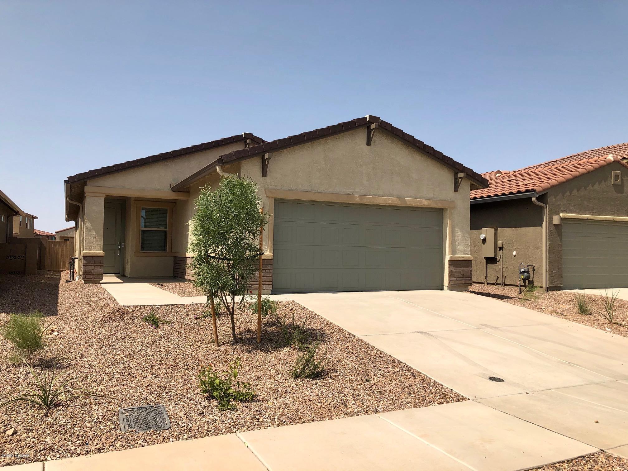 Be the first one to live in this brand new home, clean and ready to move into now. 3 bedrooms, 2 baths, and a den/family room or office. Super neighborhood with parks, pools, playground, kids splash pool, picnic tables, and ramadas too. EZ access to I-10 off of Kolb Road.