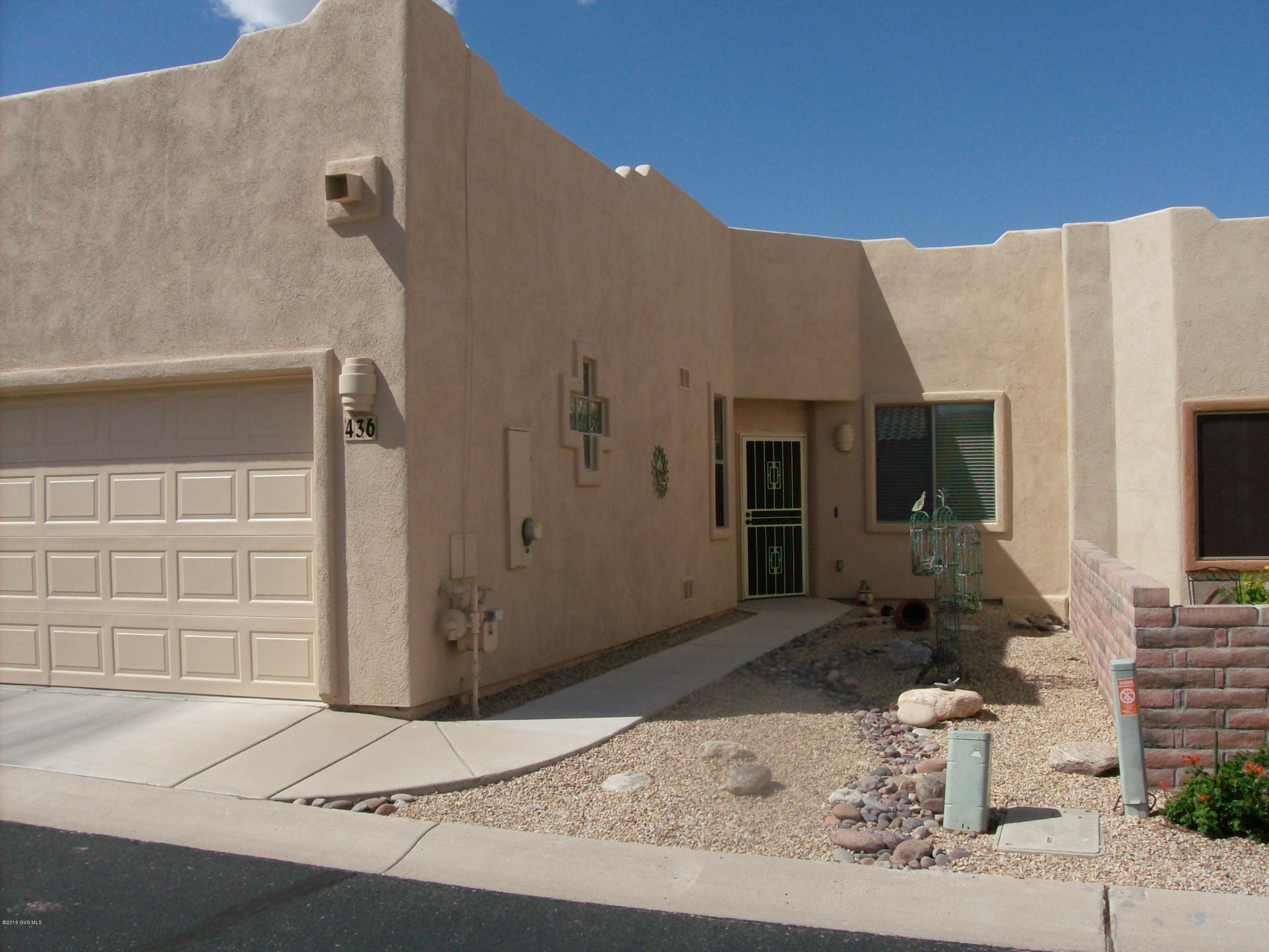 An immaculate 2BR/2Bath townhouse priced to sell! Recently painted outside. Backs to an arroyo. Very clean and ready to move in! Gas FP. Conveniently located close to golf, shopping, restaurants, churches, medical facilities, I-19, and much more! No GVR, but available.