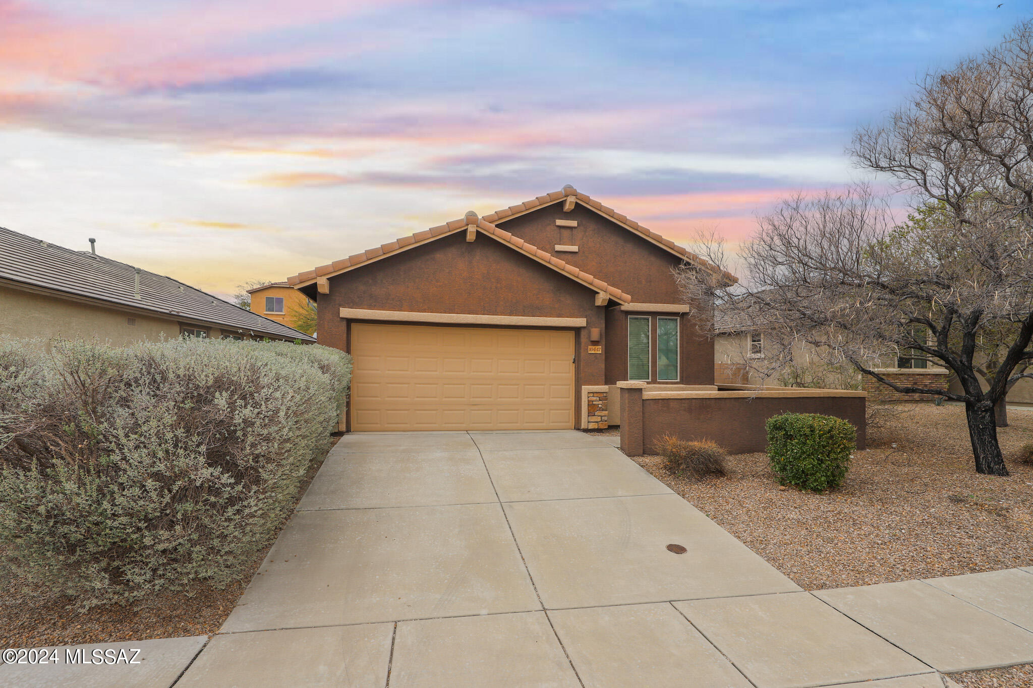 Four bedroom family home located in popular Rancho del Lago in the Vail School District. Kitchen boasts granite countertops, stainless steel appliances and ample room for cooking and entertaining. Beautiful wood and tile flooring. Neighborhood amenities include community pool and park.