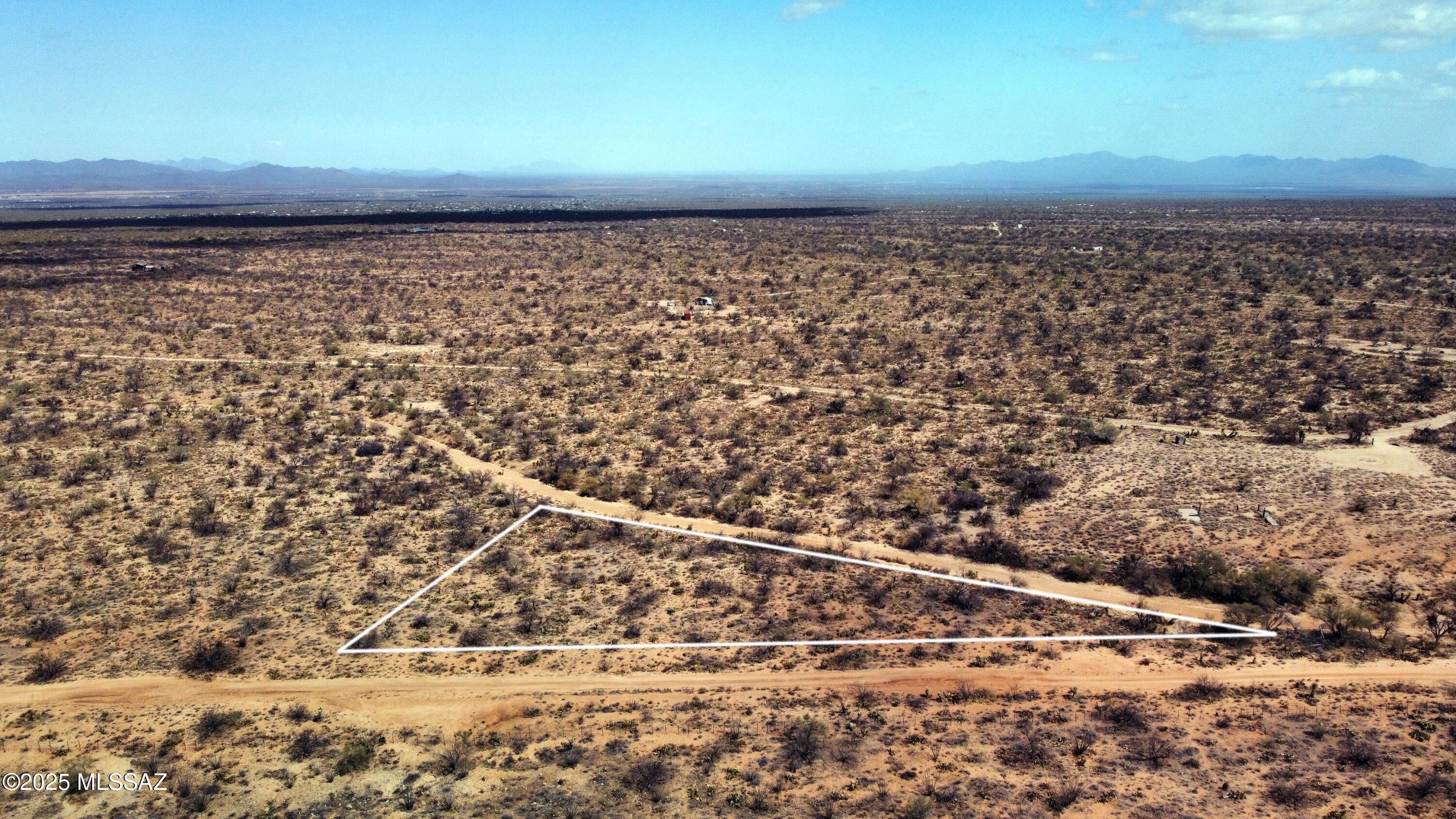 Peaceful desert lot with breathtaking panoramic views, nestled in the Diamond Bell Ranch -Tucson Unit 3 1-409.  This lot offers affordable living with abundant nature all around. Conveniently located near Ace Hardware, shopping, and dining options. Don't miss this opportunity to own your piece of the serene Arizona desert!