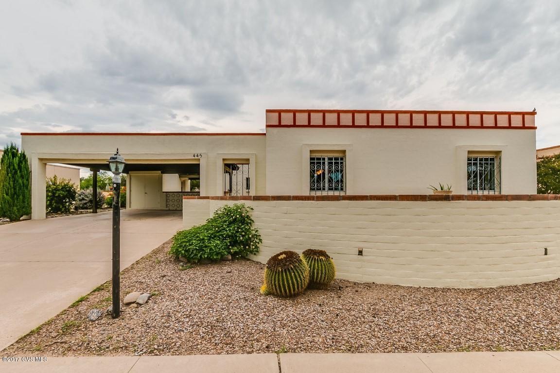 An Absolutely charming home centrally located on palm tree lined Abrego Drive in the heart of Green Valley. You will love watching the sunrise from your front courtyard patio and on rainy days you will appreciate the large air-conditioned Arizona Room in back. Inside you will find a large beehive fireplace in the great room with plenty of room for friends and family to gather. This home features three bedrooms, two bathrooms, a spacious dining area and off kitchen breakfast area. The inviting backyard is thoughtfully landscaped with mature trees and desert vegetation. Come take a look, you will not be disappointed.