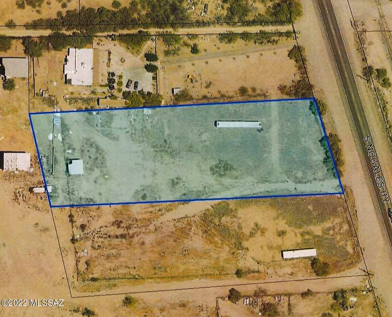 Endless possibilities for this 2 acre parcel zoned Pima CI-2, light industrial with approximately 180 feet of frontage road on Nogales Highway.  Electric, water and gas are in the street.  A septic tank will need to be installed.  Some of the many possibilities include auto repair, service station, restaurant/lounge, clinic, general store, small animal rescue and more.  The Annual Average Daily Traffic (AADT) count is over 10,000 vehicles per day per ADOT 2019 count.  Plenty of visibility for your vision!
