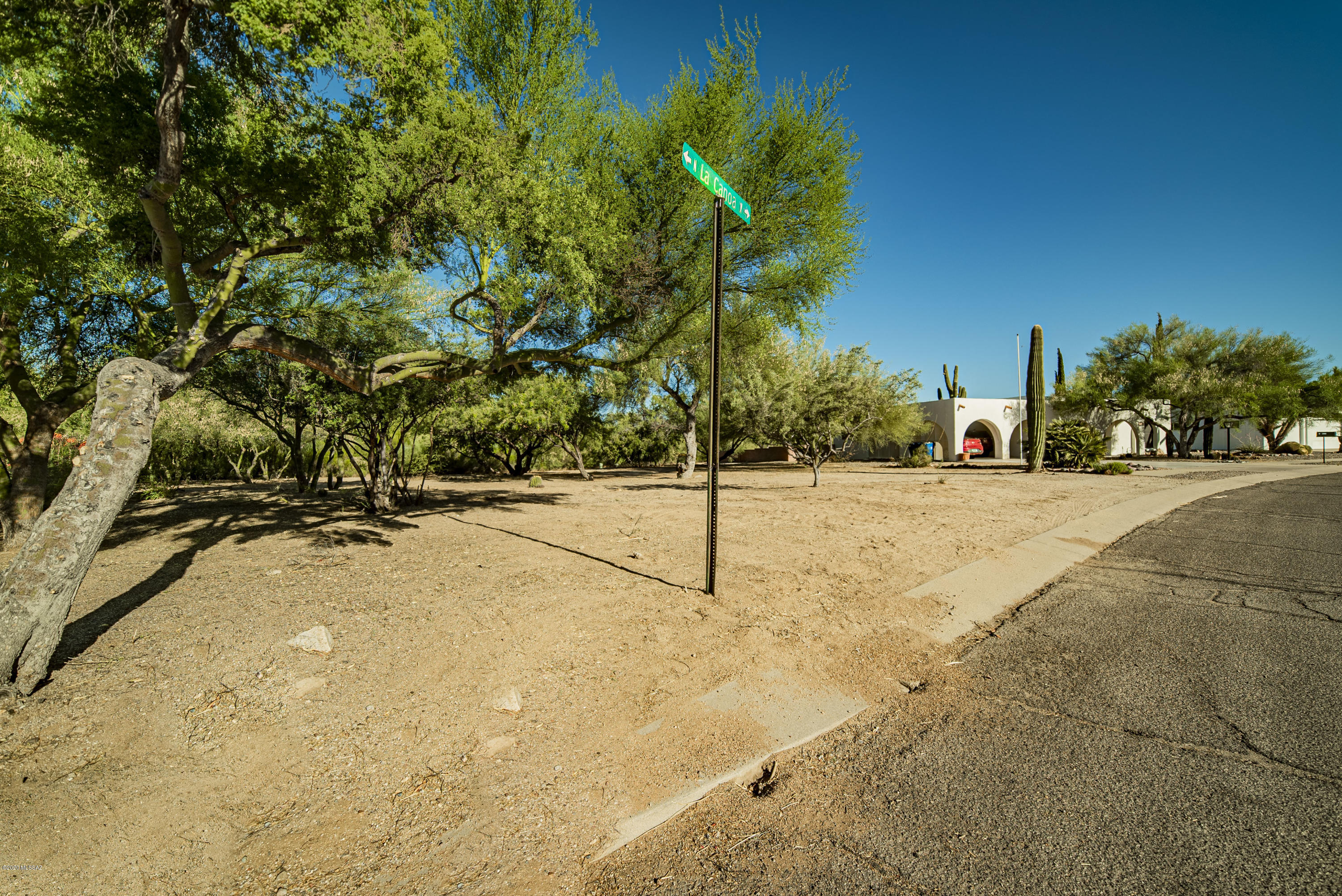 If you've been using your imagination to build your dream home, consider this lot in the Northwest area of Green Valley near shopping, churches and the local library.  Nicely groomed lot with mature vegetation to provide lots of shade to keep your home naturally cool.   A great neighborhood with larger lots and a variety of styles and sizes.  This lot has GVR membership and the HOA dues are less than $50 a year.