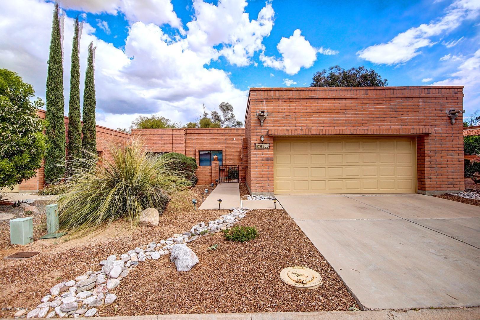 Immaculate home located in the desired Adult Community of La Cholla Hills. Open and bright 2 bedroom 2 bath with a den that can be easily turned into a 3rd bedroom. A quaint beehive fireplace to keep you warm on the chilly Arizona nights. Features include Skylights, Instant hot water, Electric Air Filter and Wrought Iron Security Entry Door. Enjoy all the amenities that the community has to offer: Pool, Tennis, Shuffleboard, Golf Cage and Clubhouse. Close to Restaurants and Shopping. HVAC & Hot Water Heater have been replaced.  Come take a look!