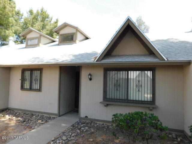 Adorable ski chalet type townhouse. High vaulted ceilings. Floor-to-ceiling fireplace. Lovingly maintained.