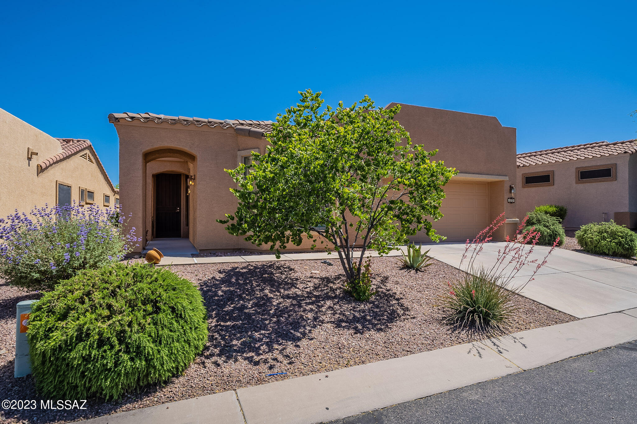 Simplify your lifestyle in Las Campanas Village! When you walk in through the front door your eyes go immediately to the Great Room with ceramic tile floors and tastefully chosen southwestern paint colors on the walls. The kitchen is a ''cook's dream'' with pullout shelves in the cabinets and plenty of counter and storage space. The breakfast bar and breakfast nook allow for plenty of seating for you and your guests. After serving your guests a meal you can move out to the beautifully screened-in Arizona Room with new epoxy flooring. The home has plenty of space for entertainment inside and out. It's a ''one of a kind'' home with everything you've been waiting for in a home. Las Campanas Village is a unique HOA that includes many items with your HOA monthly dues: cable/satellite, garbage collection, roof repair, exterior maintenance, pest control, front & back landscaping, and a blanket insurance policy on the home.