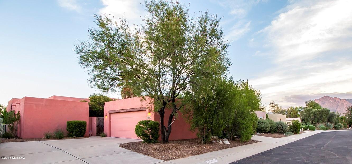 $299,500 to $324,900 Range Pricing, Seller is  Motivated. Beautifully updated Santa Fe style home, Integra masonry block construction on 12 acre private, fenced desert park with trails owned by HOA; quiet community of 39 homes. Approximately 1600 sq ft main floor w/2 bedrooms & den. PLUS a 900 sq ft basement w/ bedroom & large living area. Gorgeous updated kitchen w/ beautiful cabinetry, granite & stainless. Both baths updated w/walk-in showers. New A/C & furnace 2015. Community amenities include lap pool, spa, playground, & 12 acre park. Great location,easy access to Pima College; Public, Charter & Private schools; YMCA, Churches, Hospitals, Public Library, Tohono Chul Park, Golf, The Loop,movie theaters, dining, shopping & more. This is a beautiful home in a great community!
