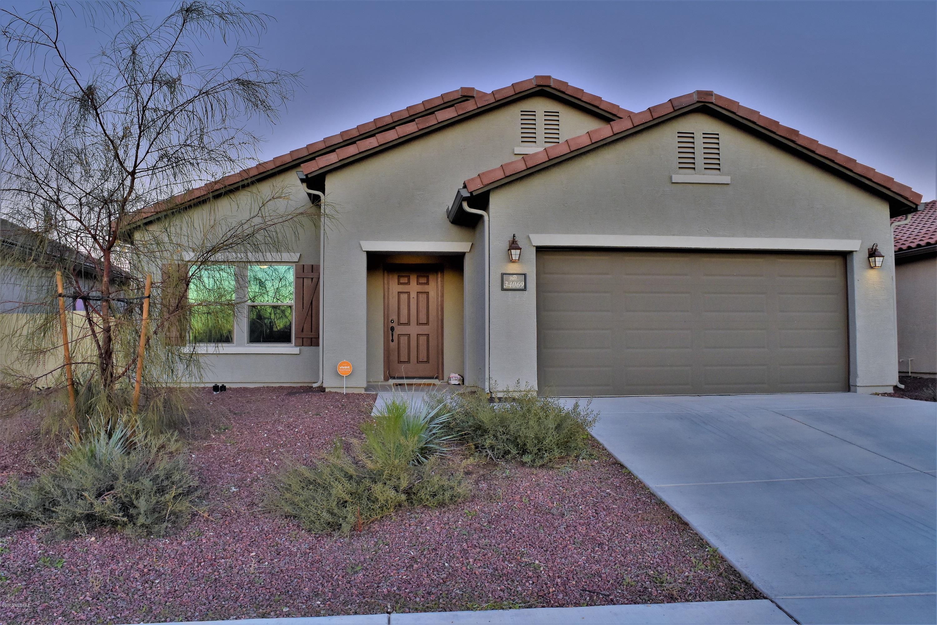 Contemporary 4 bedroom, 2 bathroom charming Pulte Home with a front Den which can be used as an office or converted to an additional bonus room. Excellent open floorplan with a Great Room concept. Master bedroom features a full ensuite with a garden tub, walk-in shower, dual sinks and large walk-in closet.  Located in the Red Rock Community Village within close proximity to 1-10. Huge Community Park with lots of amenities, pools, fields, playgrounds and skatepark!  Home has Solar panels, water softener, reverse osmosis, ring doorbell system and more! A must see, call to schedule showing!