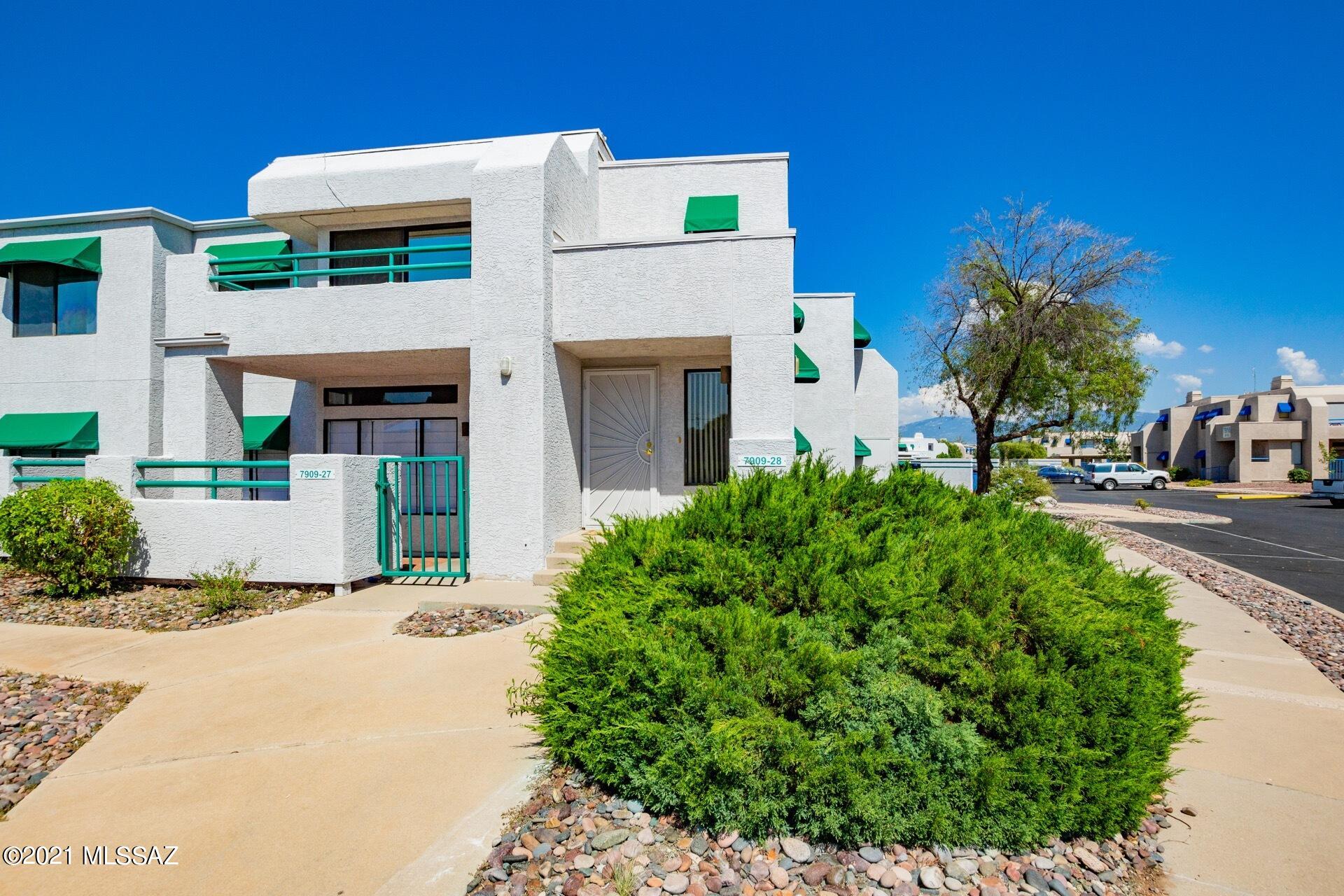 Visit this two-story, large condo on the east side before its gone!  Family room opens up to the second story balcony which overlooks the pool and mountain views. Features a double sided fireplace that divides the family room from a loft area with a window; perfect for a home office.  Galley kitchen with eat-in dining space, plus an additional dining area off the kitchen.  Large bedrooms, with the master boasting two full closets.  Extra storage in kitchen, end of hallway and on the balcony.  Brand new Whirlpool stainless steel appliances and ceramic tile in kitchen.  New paint and carpet throughout living spaces, new toilets in bathrooms, and new water heater.  This condo is move in ready!!