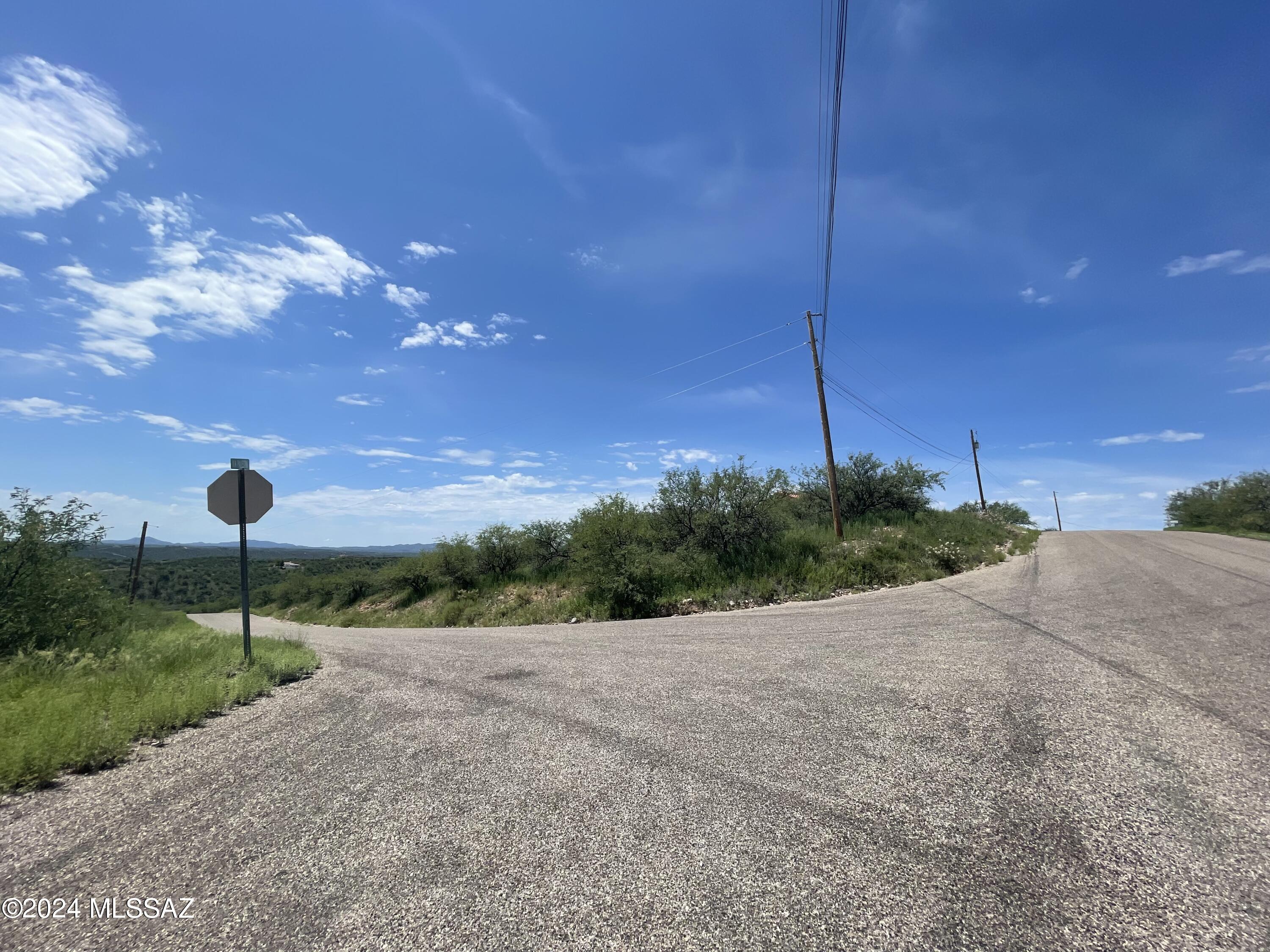 Build your dream home on this .64 acre lot with views.   This is a corner lot with 360-degree views.   The utilities are nearby.  Close to shopping areas and restaurants.