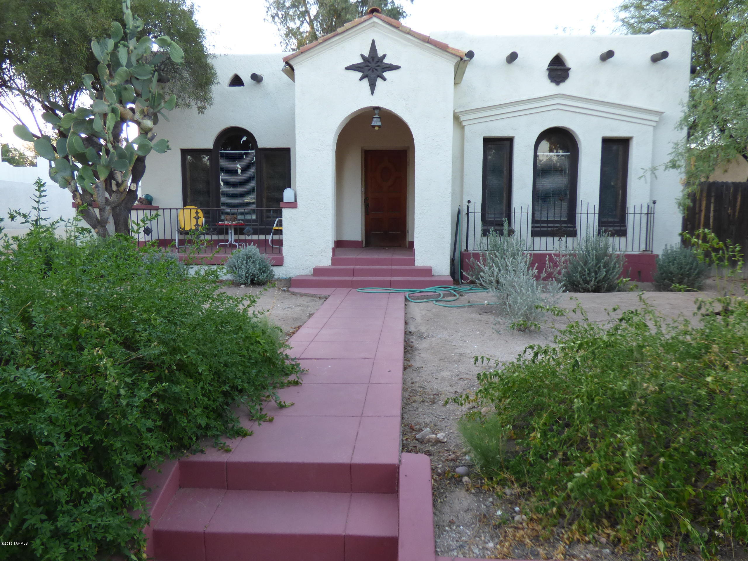 Tucson Classic. Elegant 1929 Sam Hughes Spanish revival style home ready for the next visionary owner to bring out her beauty again. Located in highly desired University Manor on an oversized lot with a period carriage/guest house and a large basement, sweet front porch, close to U of A, downtown and all things central Tucson.
Offered ''AS-IS'', you have a chance here to create your heritage starting with one of the best. Also qualifies for the ''Owner Occupant'' contributing historic property tax discount.