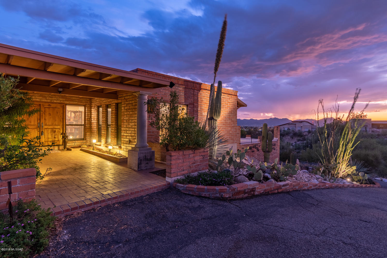 Seller will accept or counter between 475,000-500,000. Panoramic Breath taking views for miles. Extended driveway up to the top of your private lot just over a acre and a half. Step into your double front doors to the home of your dreams. This 3 bed 2 ba home, master suite with corner fireplace, custom shower/tub, dual sinks and walk in closet. Sunk in Living Room and separate family room with fireplace. Gorgeous custom kitchen with an abundance of cabinetry. Wine rack, center island with stainless steel & tile countertops. Right off the kitchen enjoy views off the walk out deck over the garage. Desert Backyard Oasis perfect for entertaining, Arizona room with built in BBQ, full length covered patio, pool, spa to enjoy the Arizona summer evenings. Endless opportunities.