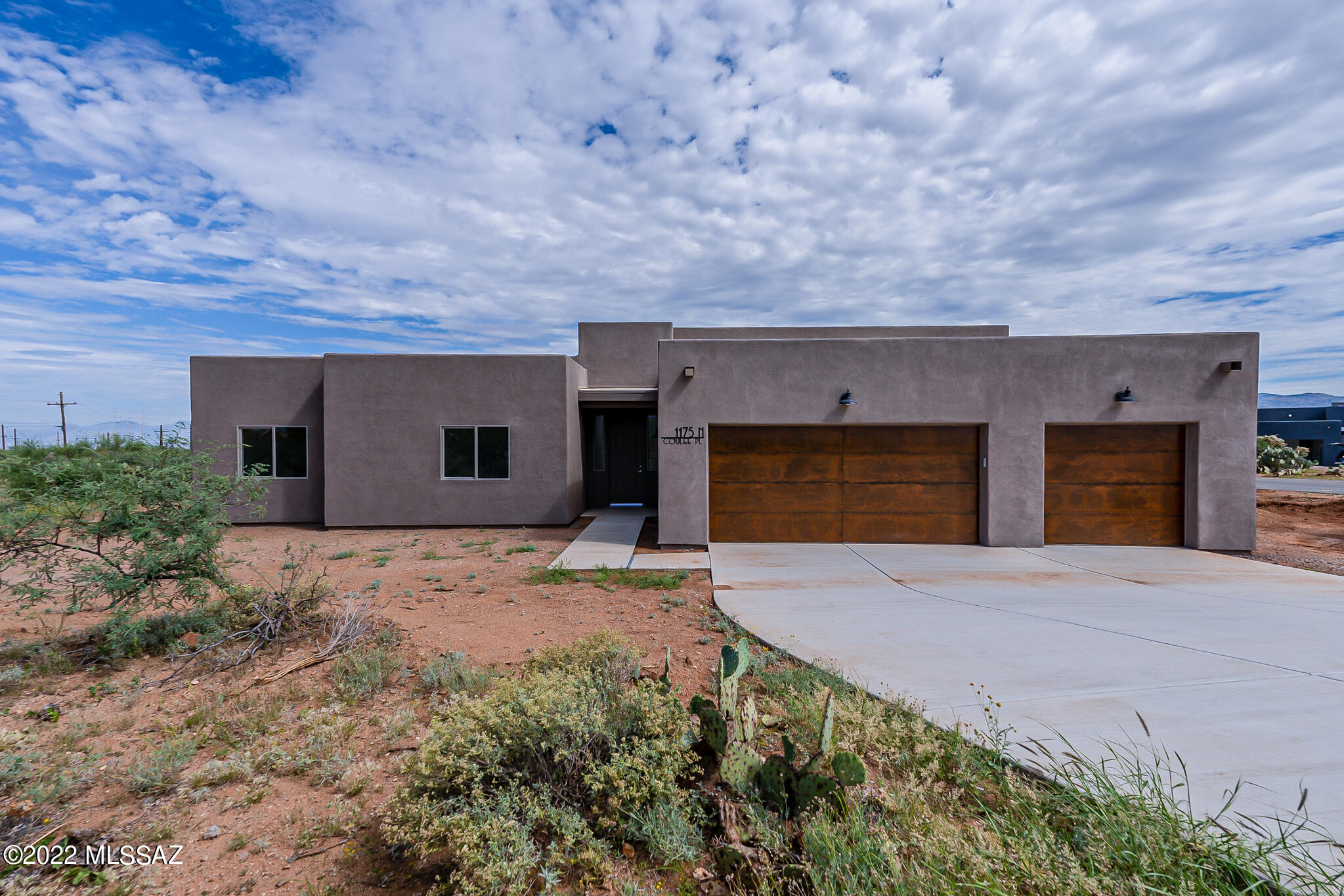 NEW INCENTIVE! Builder is offering a 2 point buy down toward your interest rate. Buy now at yesterdays rates! New construction home in Whetstones Shadows subdivision! NO HOA! Toys, boats, RVs, Trailers allowed! This gorgeous home in Vail sits on .83 acre of beautiful land. At 2154 sq ft, there are 4 beds, 2 baths & a 3 car garage. The open concept kitchen has beautiful cabinetry, a large breakfast bar, double ovens, a stainless steel appliance package, canned & pendant lighting & under cabinet lighting. The master bedroom features patio access, a huge master closet & a stunning on-suite bathroom with dual vanities, custom tiled walk in shower, glass door & a jetted garden tub with tile surround. Incredible 1 GB fiber optic internet available! Vail Schools. LA related to seller.