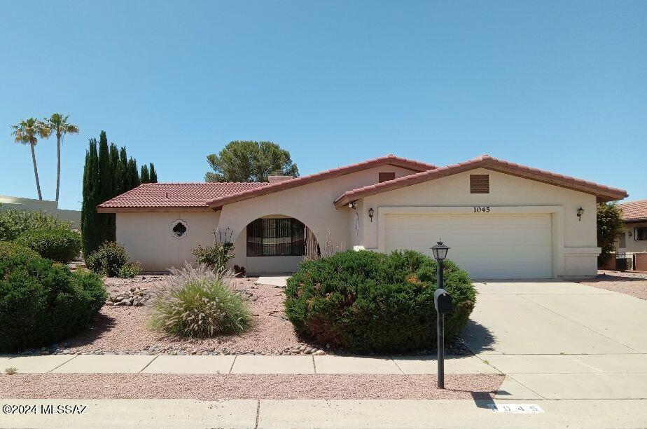 Located in the heart of Green Valley in the Green Valley Country Club Estates, this 3/2 backs up to the country club on a circular interior street - no freeway of major arterial road noise!  Enjoy the Arizona Room with golf course views from the rear yard and morning sunrises from the front covered patio.  Priced AS-IS for your preferred updates.