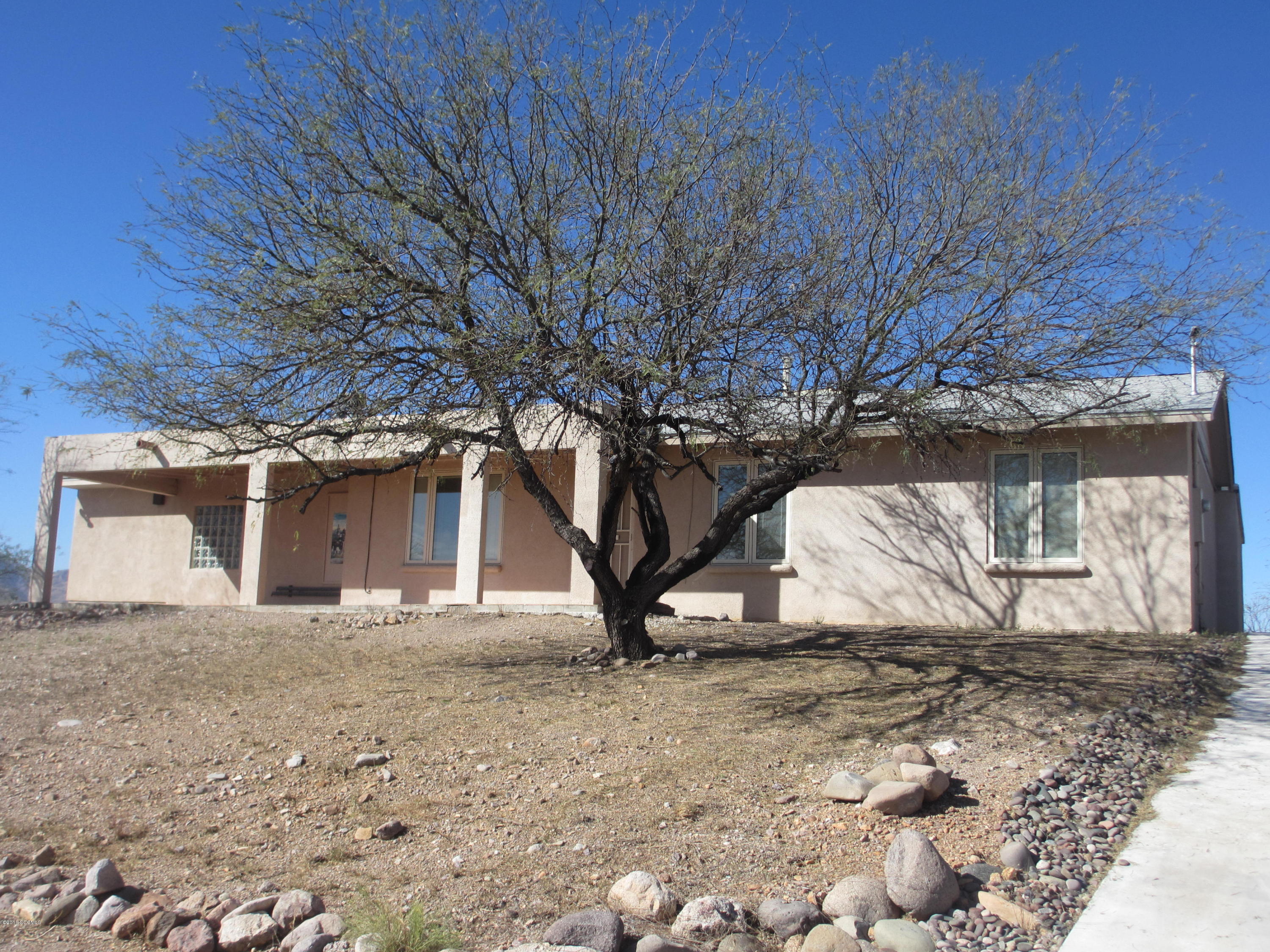 A very nice, well-built home with spectacular views !!!! Has saltillo tile throughout, new kitchen w/ granite countertops, lots of storage and closet space, warm and inviting fireplace, enclosed back porch with absolutely gorgeous views of the Atascosa Mountains...[] A ''must see'' !!