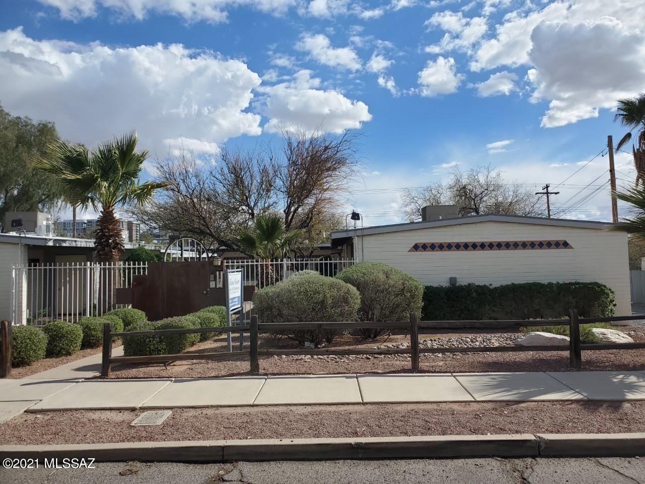 Adams Court is an 8 unit secure gated complex that surrounds a central landscaped courtyard. Adams Court has been been extensively renovated and is perfectly situated to the University of Arizona. It is located just four blocks north of campus, six blocks to Rogers College of Law and seven blocks to Banner-University Medical Center. Completely remodeled kitchen and bathrooms, updated electrical and HVAC systems, newer water heaters, freshly painted interior and exterior, coin-op washer and dryer, upgraded LED lighting, tiled flooring. Please see the improvement list in attached documents. See more and agent only sections for info on additional units available. See MLS 22108771 Rents are low. Attached documents contain rent roll, insurance information and extensive upgrade list. Visit tarolaproperties.com for information on some of the other properties for sale including 10th & Mountain 22108771.