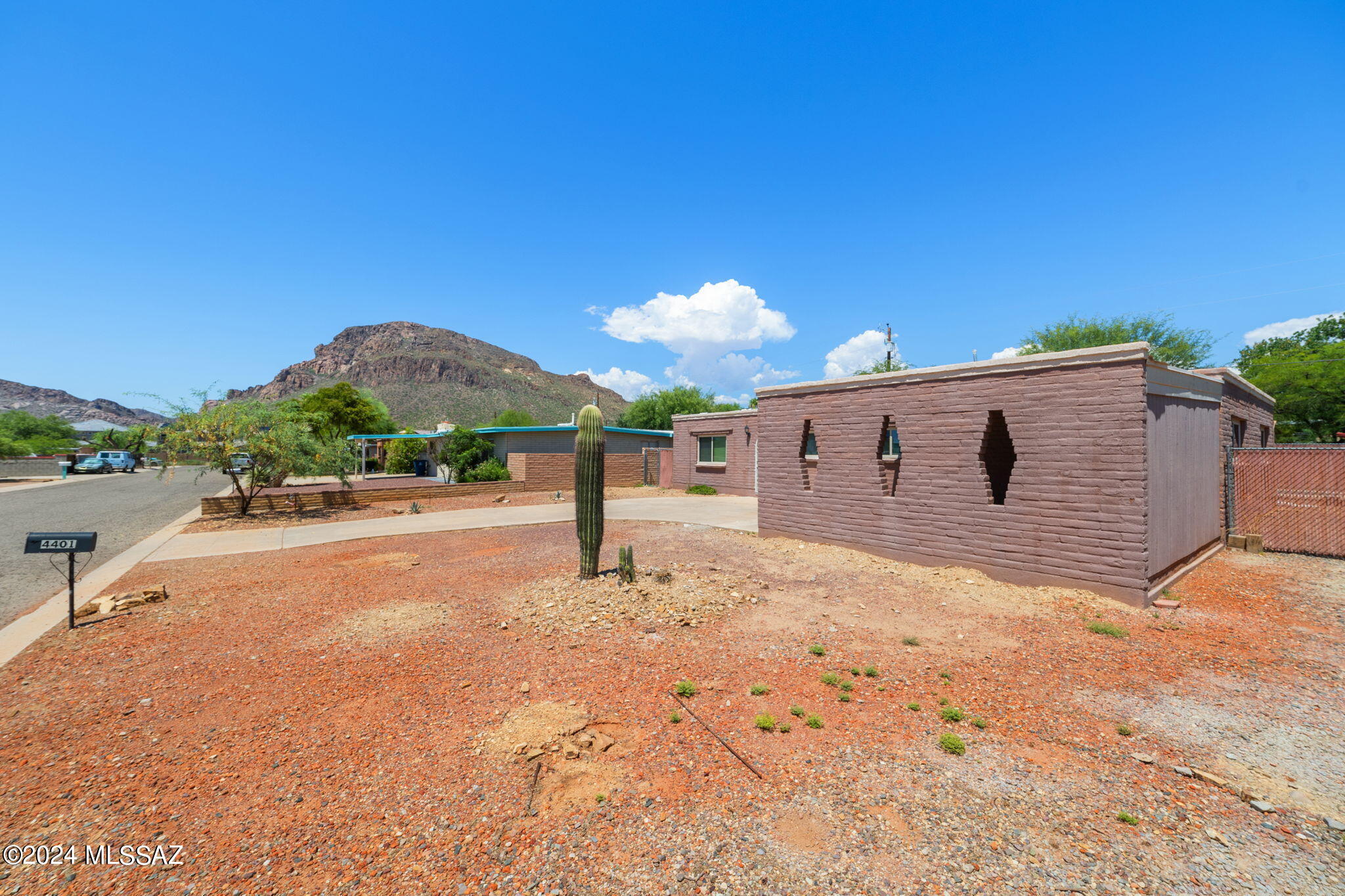 Don't miss out on the opportunity to join this established Tucson Mountain Village neighborhood nestled in a growing community! This 4 bed, 2 bath home is ready for you to make it yours.  The kitchen was renovated in 2018 with upgraded appliances and updated electrical in the kitchen, bathroom, pool pump and the 2-car carport. The cocktail pool will help stay cool during these hot summer days and if you don't feel like taking a dip, then seek shelter inside with the new HVAC unit keeping things cool. 
With the addition of the Bisbee Breakfast Club, Starbucks and the legendary Tiny's Saloon, you are located within minutes of a quick getaway. Seeking more variety of shopping and dining, you'll be located within 10 minutes of Tucson Spectrum! Let's set an appointment to see your next home!