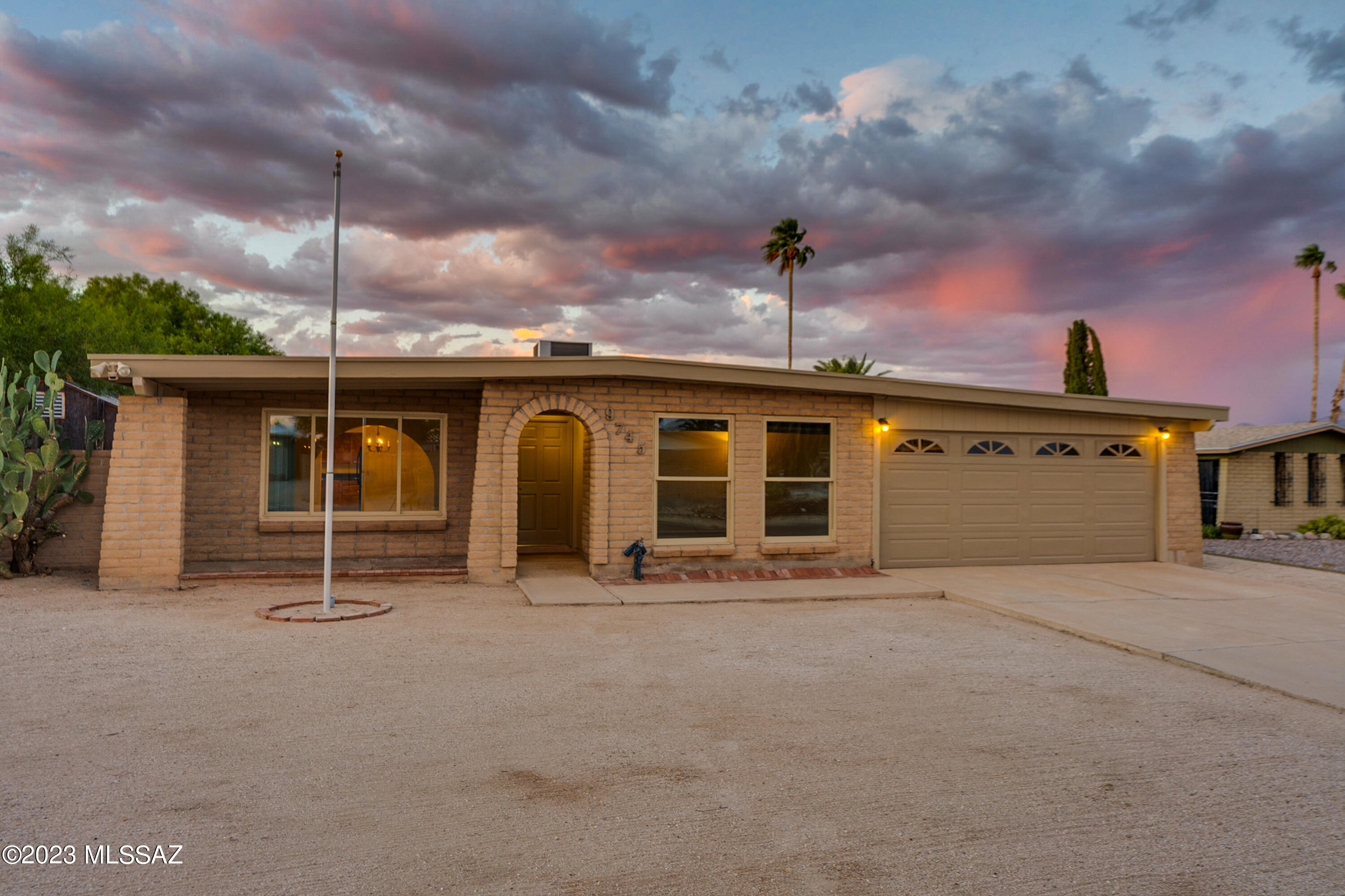 No HOA! This ranch style, 4 bed/2 bath home offers more than just a place to live; it's a lifetime of memories in the making. With a single, dedicated owner who has lovingly cared for this home, you will find unmatched charm and the awe-inspiring backdrop of the Catalina Mountains. The roof was recoated in September 2023, along with painting the interior and exterior fascia.  The AC/Heater was replaced in 2022. The 2-car garage with overhead storage makes this home a true gem that you don't want to miss.