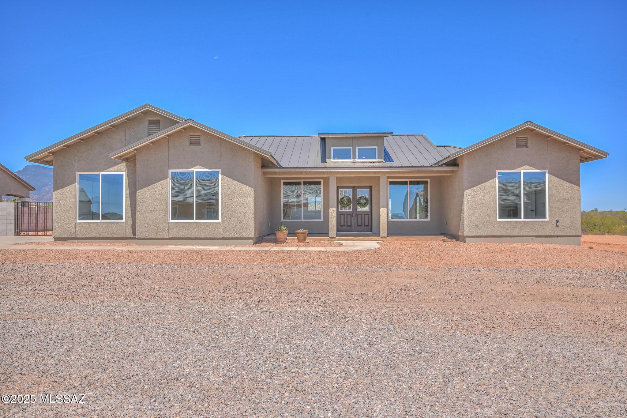 Back on the market at no fault of the seller! YOUR SEARCH IS OVER! Come view this gorgeous new construction 4-Bedroom  2.5-Bath custom home by Frederick John Homes, near Sierra Reserves! This 2,401 sq ft stunner features an open design, soaring ceilings, custom lighting, a double door entry, and beautiful tile throughout this lovely home. Spacious, inviting rooms and luxurious guest baths with champagne fixtures, elegant tile, and designer vanities. The primary suite offers serene mountain views, a spa-like bath with deep soaking tub, walk-in shower, and large walk-in closet. Thoughtfully complimented with an oversized side-entry 2-car garage and a fully fenced backyard with RV gate.  This new home has it all! An absolute MUST SEE and move-in ready!