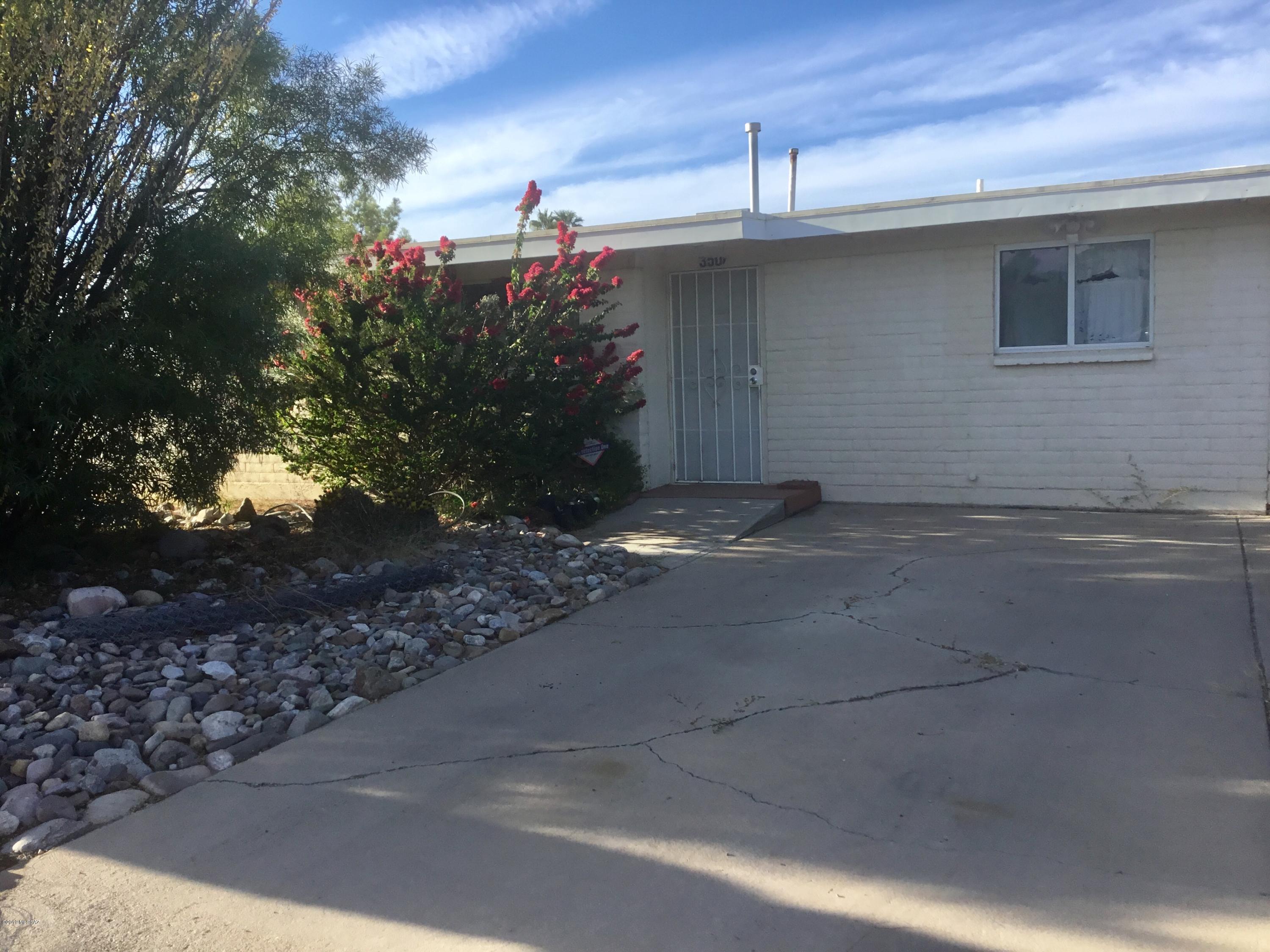 Large corner lot with a beautiful park right across the street and community pool nearby. Home is being sold as-is. Some TLC will bring this home back to its glory. The wall between the 2nd and 3rd bedroom was removed to enlarge closet in master bedroom and make a large secondary bedroom with a Murphy bed. Bonus room can be converted to a 3rd bedroom with the addition of a door. Very spacious eat-in kitchen. Covered patio. Large rear yard.