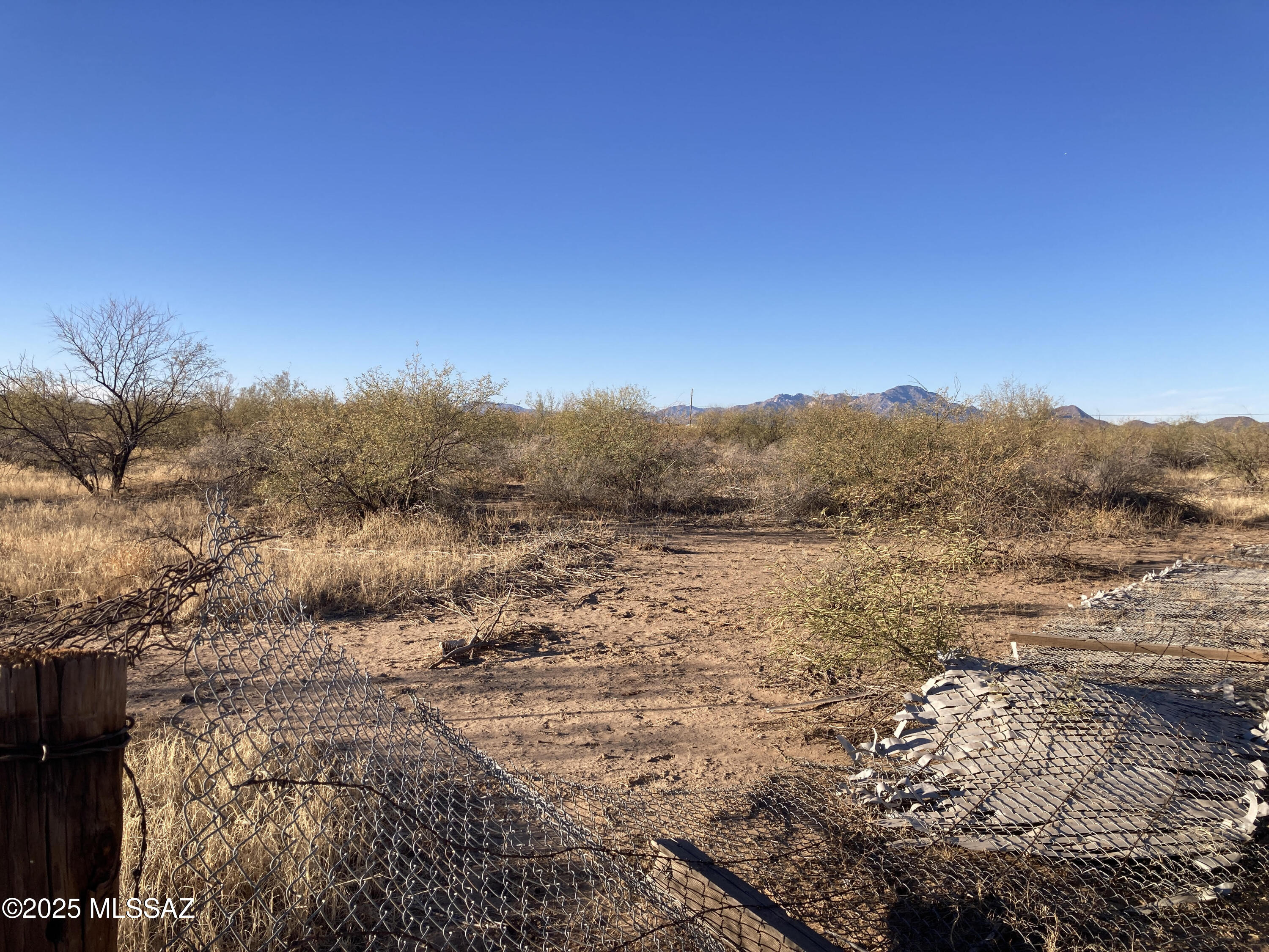 Level 5 acre lot in Three Points with water and power - great building lot or for mobile.  Wire fence needs some mending.