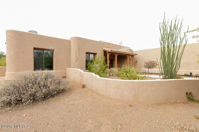 Bright and open single story home on 1.8 acres with views for days. Property
features 4 bedrooms, 2.5 baths, a designer kitchen with large center island, gorgeous tile floors and opens to a great room with lots of natural light. The backyard is an outdoor oasis with a surrounding patio cover, in-ground pool and mature shade trees. The home is in need of some TLC but could be a spectacular residence with a little work.