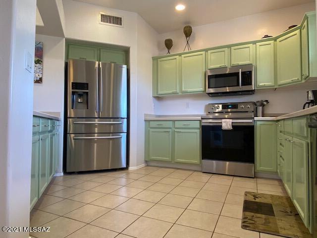 Condo #235 at Vistoso includes A DETACHED GARAGE perfectly located in front of the condo building.  All furnishings and accessories (TURNKEY) are included in this sale.  NEW HVAC SYSTEM installed in 2020!  This VACATION RENTAL is ready for tenants soon after your closing date!  HOA includes internet modem for WIFI, basic cable, water, trash and recycling, landscaping maintenance, clubhouse with fitness center and TV room with bathrooms for residents and guests, TWO community stainless steel gas grills, gas fire pits, pool heated all year to 82 degrees minimum, Jacuzzi, roof, rodent control, exterior building and GARAGE maintenance, paving, and more.