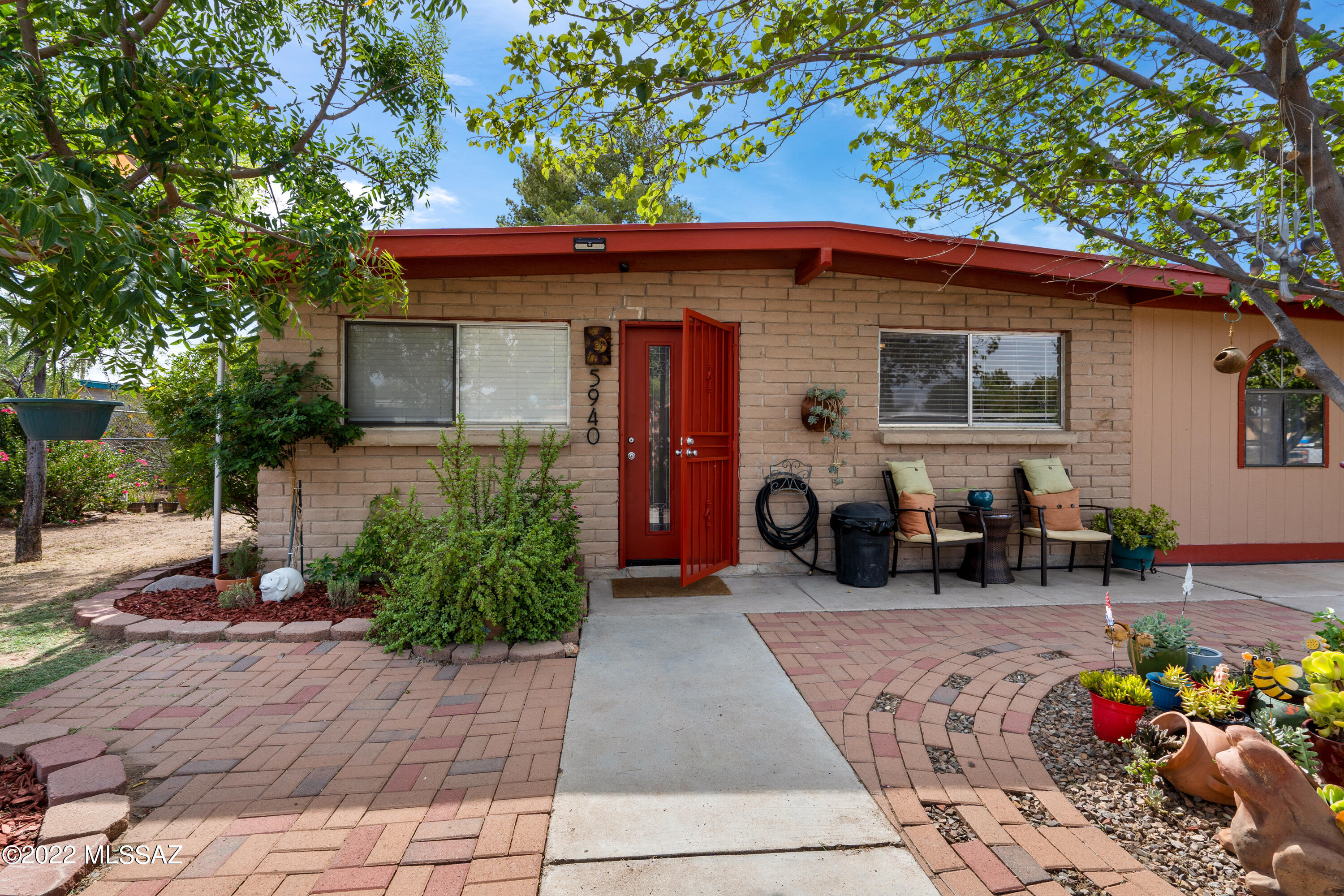 This one is a GEM! With 4 spacious bedrooms and a completely remodeled interior, New HVAC, New Roof, New Water Heater, New Plumbing, updated electrical panel and lush landscaping, there is nothing not to love about this home. 

Interior features include tile all throughout, freshly painted interior, large dining room, open kitchen/living area, new light fixtures, 2 full updated bathrooms, updated kitchen and plenty of space for entertainment. 

Step outside and enjoy the large fully gated/fenced yard with not one section untouched by impeccable landscape. The nearly quarter acre lot boasts several mature citrus trees, gorgeous blooming desert shrubs, pavers, large covered back patio with ceiling fans and  freshly painted fascia and trim.

Really a true example of pride of ownership