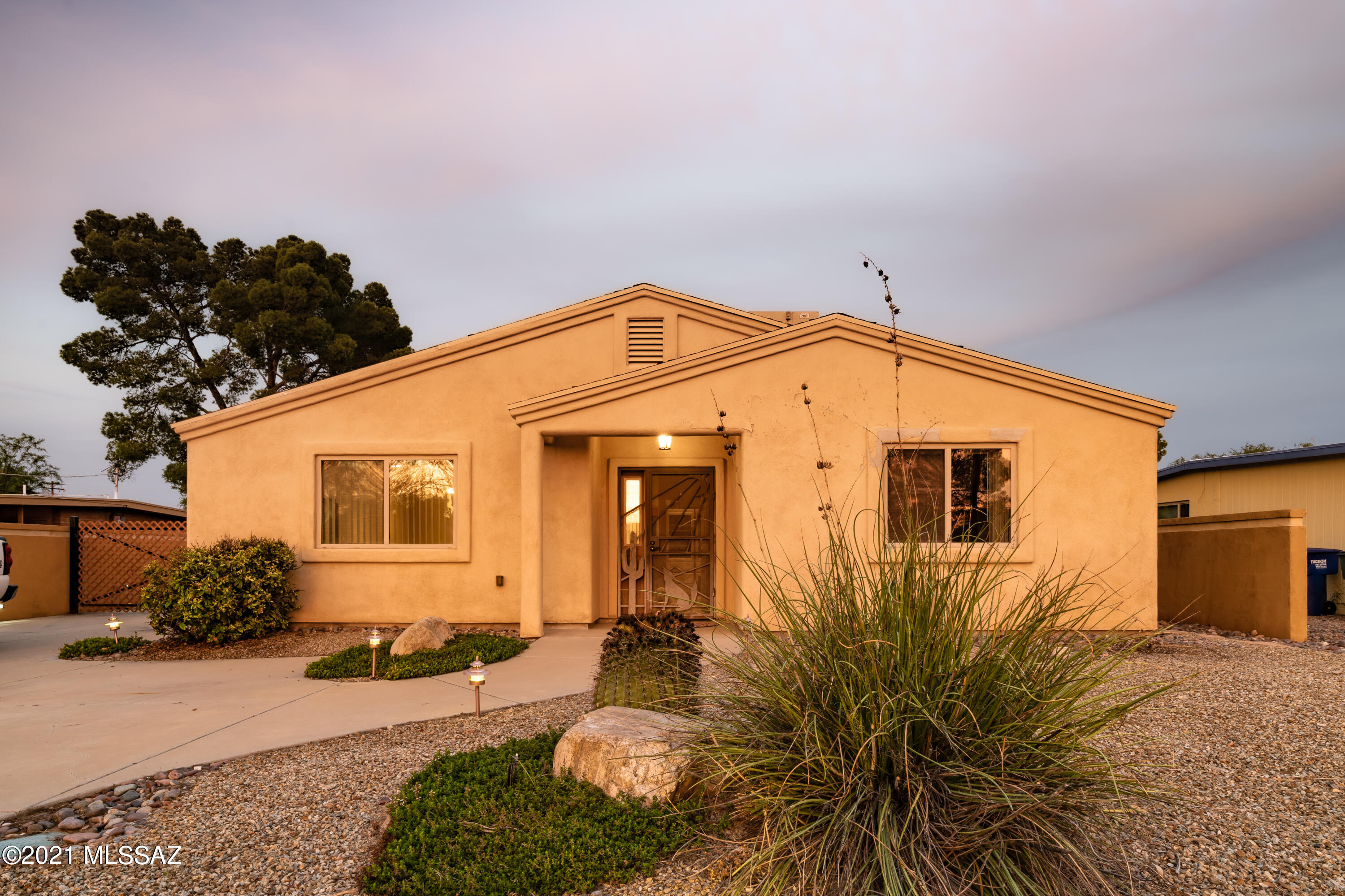 Incredible open concept w/ 18'' ceramic tile flooring on the east side w/ NO HOA. Kitchen features granite countertops, custom wood cabinets. Additional bathroom features granite countertops with a shower and tub w/tile surround w/custom wood cabinets. Master bathroom features ceramic tile flooring w/ custom wood cabinets, jetted tub, walk-in shower. Gorgeous Arizona room that is not included in the square footage that leads into a patio with a built-in gas BBQ w/ utility sink. Backyard features spacious driveway that fits 5+ cars w/ RV gate. Backyard boasts Oversized shed in the backyard that has electrical w/ water line and plumbing line adjacent to the storage shed which can easily be converted to guest house or garage. Home is walking distance from hospital, shopping, fitness and more!
