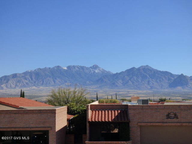 VIEWS!!! 2 Bedrooms, Living/Dining, Den, Arizona Room, Nice Bedrooms with an office and his and her walk-in closets. Easy Care Yard. Great Value.