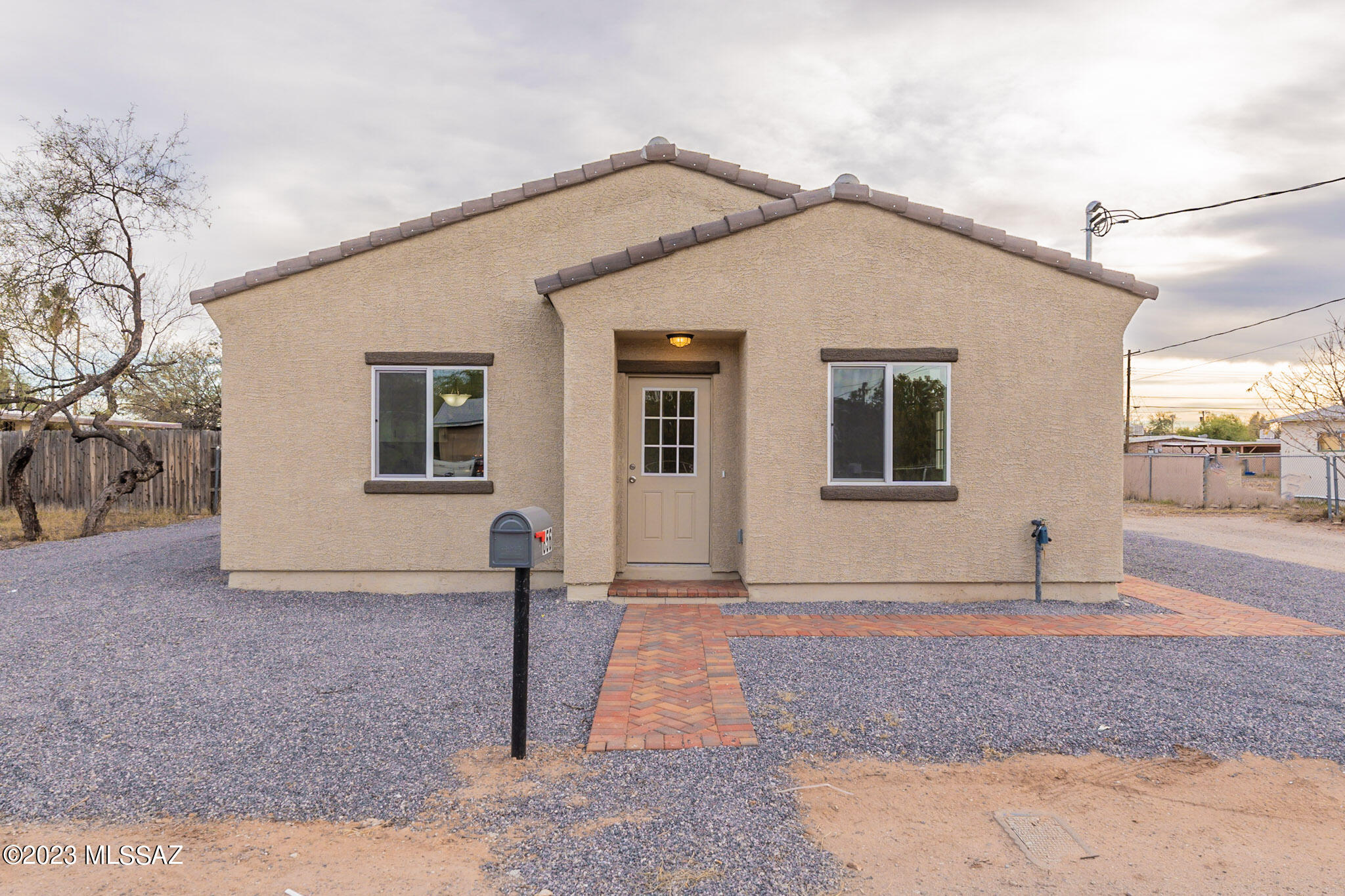 This new construction home boasts high end finishes and an open concept design. It features 3 large bedrooms and 2 bathrooms, with 10 ft ceilings and granite counters. The home is located in a quiet neighborhood, conveniently near the University of AZ and close to I-10, malls, and many other amenities. The seller is including 20 (65in x 40in) solar panels with the full purchase price, with the buyer responsible for obtaining the necessary permits and completing the installation. The seller is also selling the adjacent home at 850 E, Graybill Drive. The home us currently pending final inspection, scheduled for early January 2023. Agent/Owner.