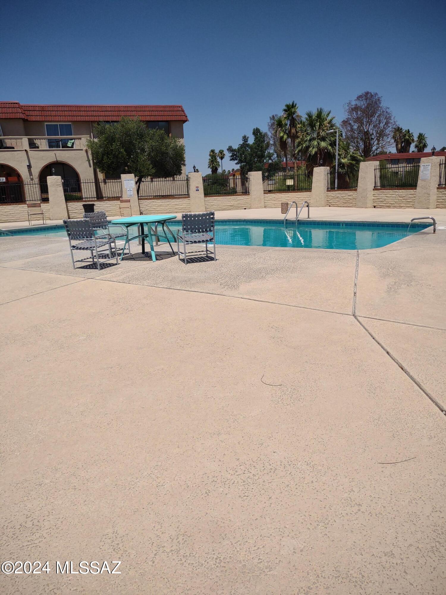 Super cute, 2-bedroom 1-bathroom condominium on 3rd floor. Fantastic views of the Tucson Mountains to the west from both bedrooms and the large patio. Tile flooring in kitchen, hallway and bath, carpeting in living and bedrooms. Updated bath with pedestal sink and comfort height toilet. 
There is a sink and vanity in the master bedroom walk-in closet. A new Bryant AC/Heating unit was installed in May of 2022. including a new ionic air filtration system.
Walking distance to public transportation, shopping and restaurants. Conveniently located north of downtown, but close to recreation, the Loop and hiking. 
HOA includes water, trash, natural gas for heat and hot water, exterior maintenance, blanket insurance and 2 community pools.
Why pay rent? Parking Space is #3