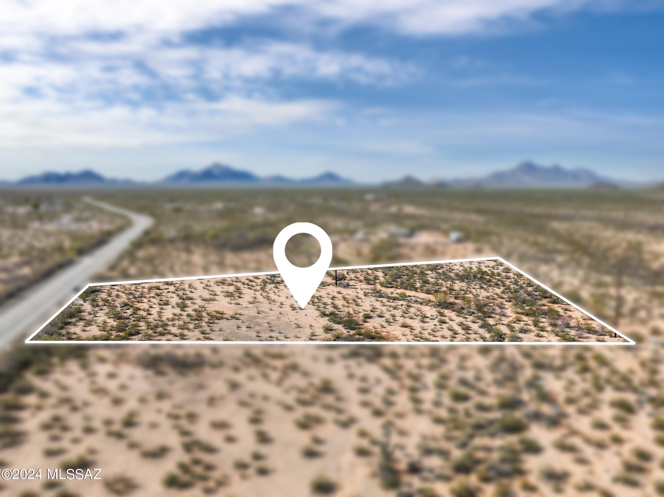Explore the potential of this 4.31-acre oasis in Marana, Arizona. Ideal for crafting a serene retreat or multiple homesites, this strategically located parcel offers tranquil landscapes. With utilities within reach and the freedom to build a house, place a manufactured home, or even live in an RV, the possibilities are vast. This property, free from HOA restrictions, invites you to turn your dreams into reality. Don't miss the chance to make your mark in this Arizona haven. Seller will take offer terms into account in addition to the sale price.