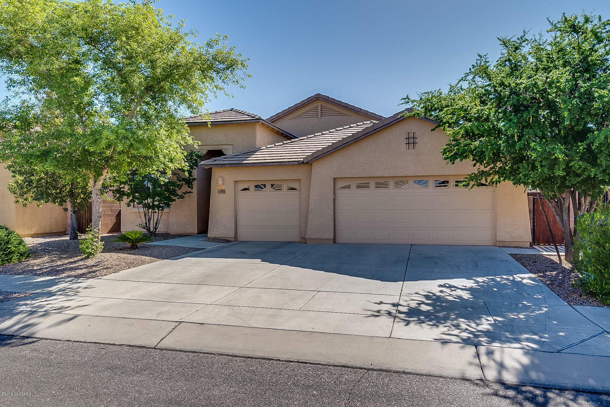Come see this 3 bedroom 2 bathroom home in Valencia Reserve!  This home offers fresh interior paint throughout.  The kitchen features granite countertops, stainless steel appliances, an island and built in desk.  Open family room with dining area and separate living room.  Large master bedroom with walk in closet.  The master bathroom boasts dual sinks, separate shower and garden tub.  Split bedroom floorplan with dual sinks in hallway bathroom as well.  Great backyard with covered patio and inviting views with no neighbors behind!  Paved walking trails right behind the home.  Close to shopping, dining, and the freeway!