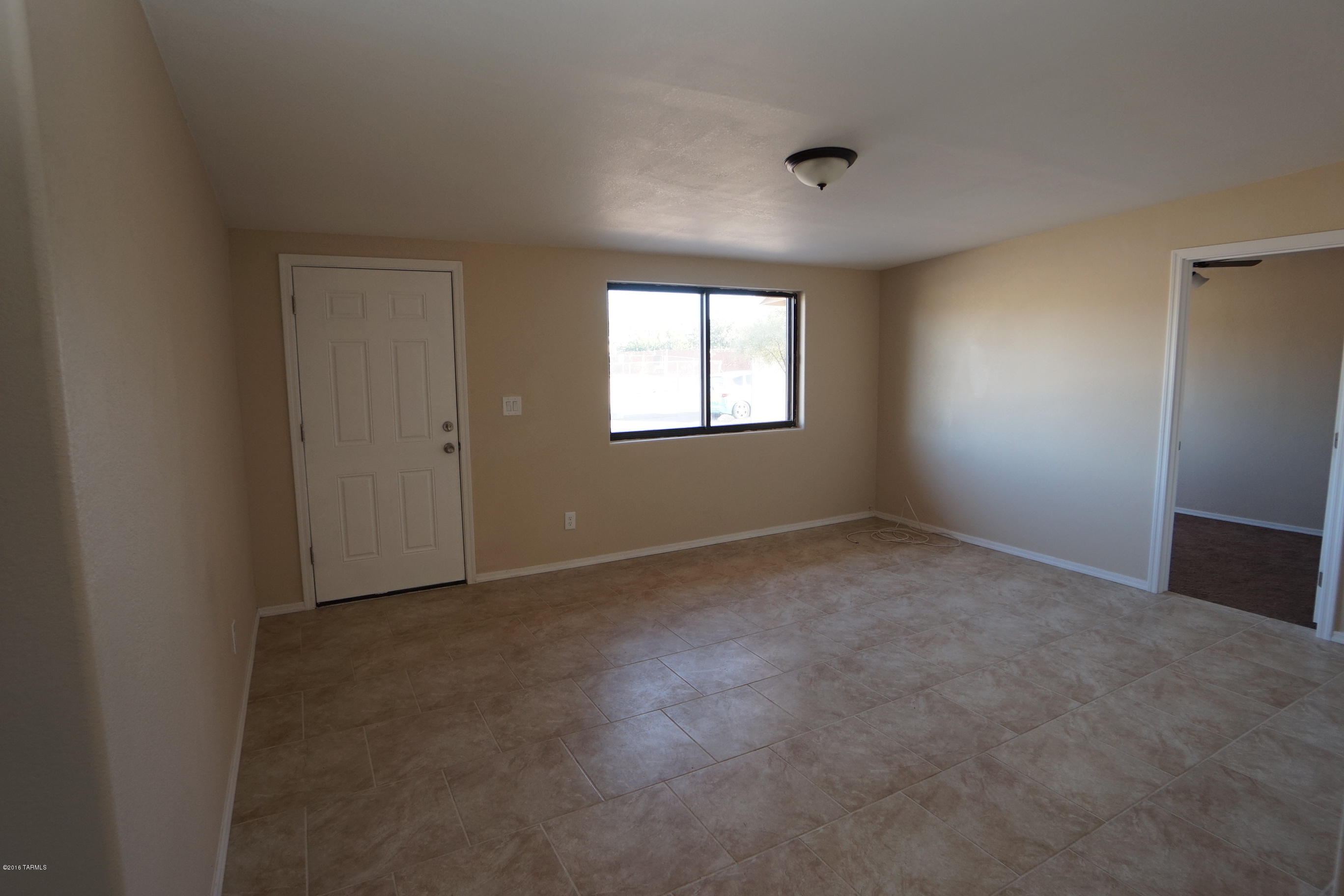 Lovely 5BD/1.75BA ranch home in Mi Tierra. Completely updated with newer windows, fully updated tile work, new A/C, kitchen with stainless steel appliances. Ceiling fans throughout. Large enclosed backyard with covered patio. Extra parking area in front. Convenient to schools, park, shopping, transportation & I-19. Qualifies for Pathway to Purchase program. A lovely home at a great price, come and take a look today!