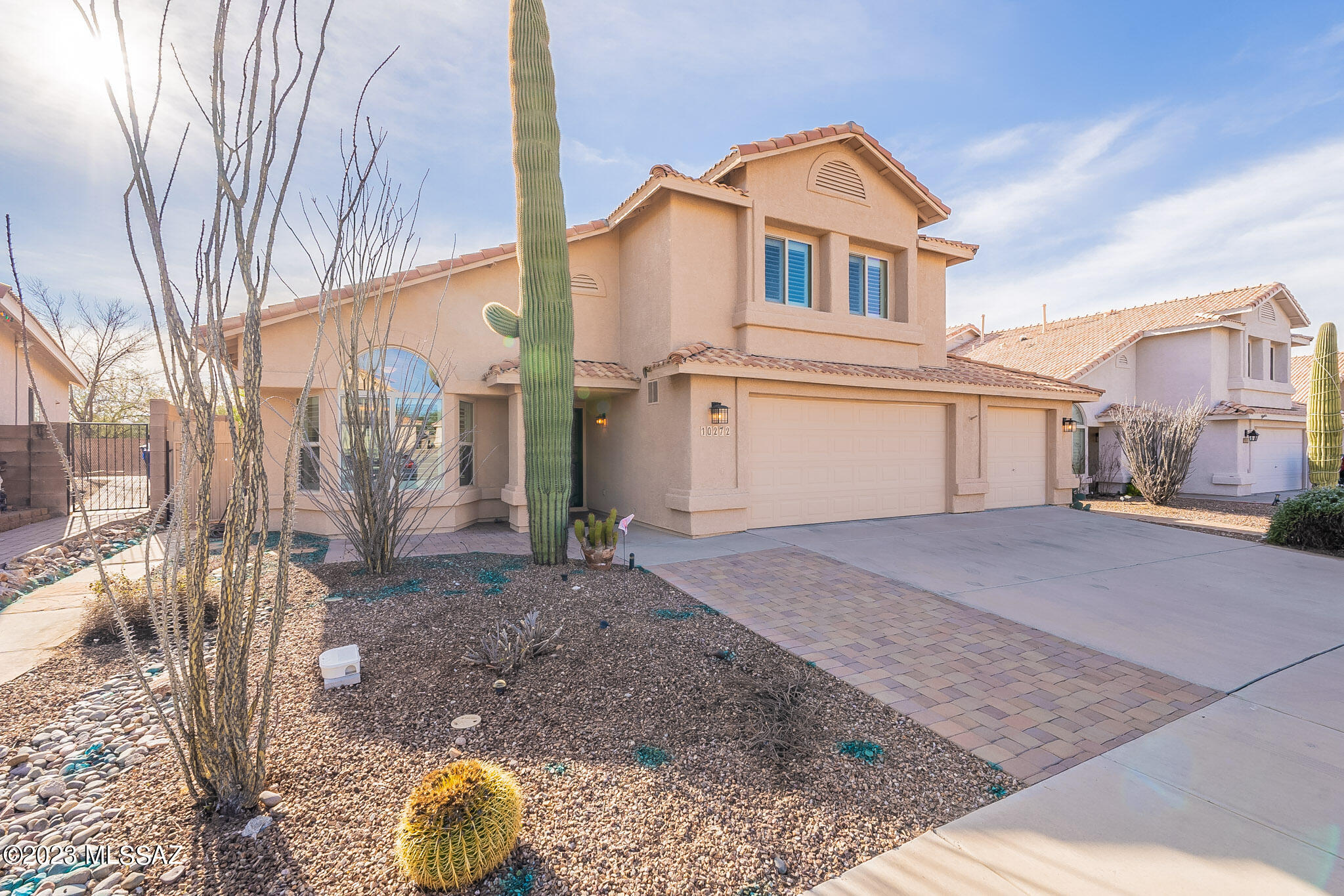 Awesome large East side home with plenty of room for large/growing family.  Relax under covered patio, with private backyard and viewfinder fence. No direct back yard neighbors.  High ceilings, large rooms, and plenty of bedrooms and bathrooms.   Kitchen has stainless steel appliances, plenty of cabinets, countertop space and eat in dining area.  Full bath downstairs and bedroom which can be used for office/den.  Upgraded 3 car garage, with utility sink, wall AC, and water filtration/softener.  Landscaping is low maintenance in front and backyard with commercial grade irrigation system.  Nature trail behind the house connect you to Chase Park.