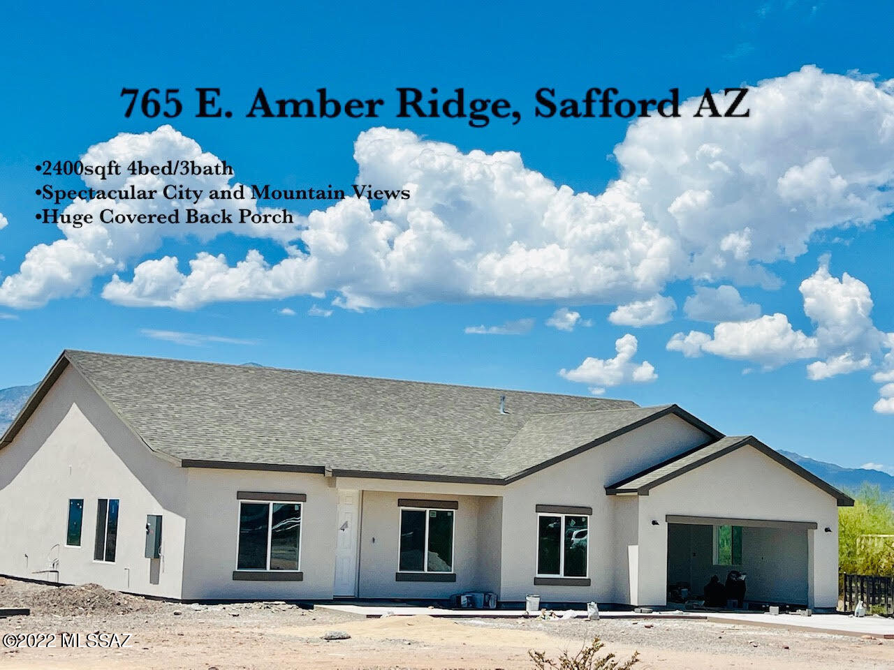 Spectacular views of the city lights right from your huge back porch!  This lovely home is almost to completion and ready for you to make it your own.  You are going to be amazed at the large living spaces and outstanding great room that opens out to the porch that extends the entire back of the house!  There is a large living room as well as the kitchen/ gathering room.  You will be able to enjoy the city lights from the large windows in both the Great Room and the Master Bedroom. Enjoy the quiet cul-de-sac and desert lifestyle. There aren't many new builds ready for purchase with this much land and with the views.  Come and claim this one before someone else does!