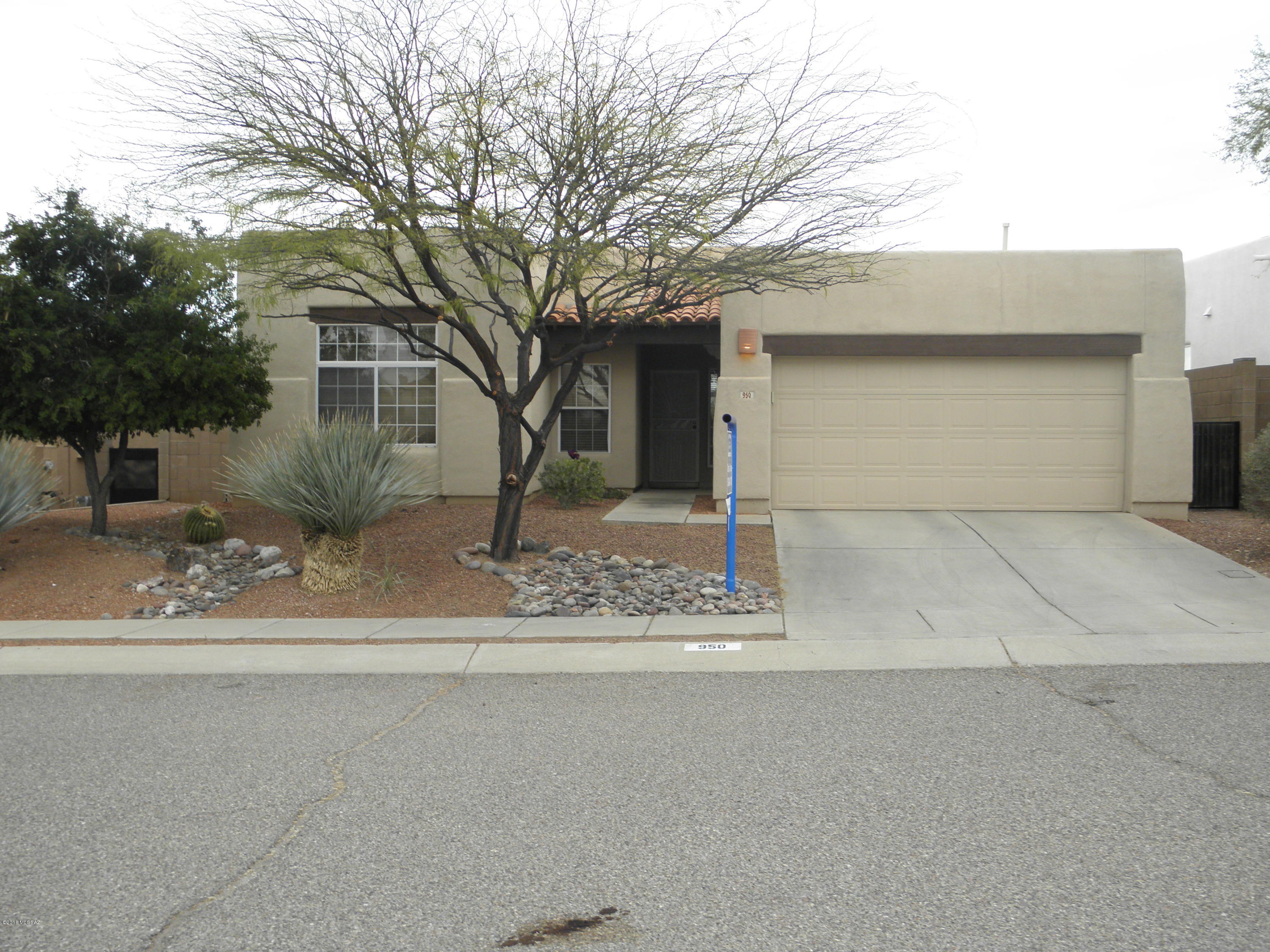 THIS BEAUTIFUL HOME REFLECTS THE BEST OF THE DESIRABLE SILVERADO HILLS. REMODELED   BY OWNER NOT FLIPPER. START WITH THE WOOD FLOORS, STUNNING REAL WOOD FOR A LIFETIME OF BEAUTY. THEY ECHO THE STRIKING LIVING ROOMS HIGH CEILING OF WOOD WITH VIGAS THAT MAKE THE SOUTHWEST AMBIANCE POP. GAS LOG FIREPLACE. SLIDING DOOR REPLACED WITH FRENCH DOORS TO THE EZ CARE BACK YARD. REMODELED DESIGNER KITCHEN IS GOURMET DELIGHT WITH FIVE BURNER GAS STOVE, GRANITE COUNTERS, NEW MAPLE CABINETS AND DISHWASHER. STOCK THE PANTRY AS YOU WILL LOVE COOKING HERE! MASTER SUITE IS SEPARATED FROM OTHER BEDROOM FOR PRIVACY.HAS ENLARGED SHOWER AND GARDEN TUB IN MASTER BATH.BACKYARD WITH MTN VIEWS OF CATALINA AND RINCONS. AC REPLACED 2014 AND HOT WATER HEATER IN   2015. TURNKEY AND READY FOR YOU.