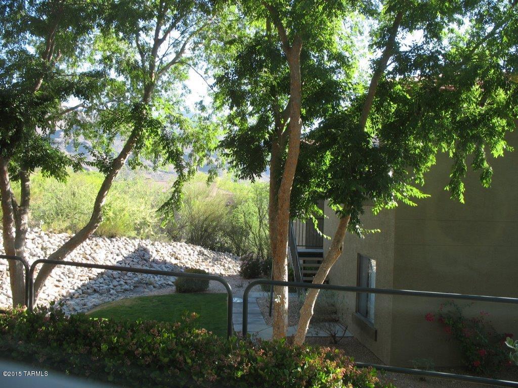 Fabulous first floor featuring granite counter tops in kitchen and black appliances. Split floor plan with walk in closets in each bedroom, linen closets on both sides of the condo, lots of space between bedrooms. Close to parking and adjacent to common area. Nicely upgraded with some mountain views from the patio.