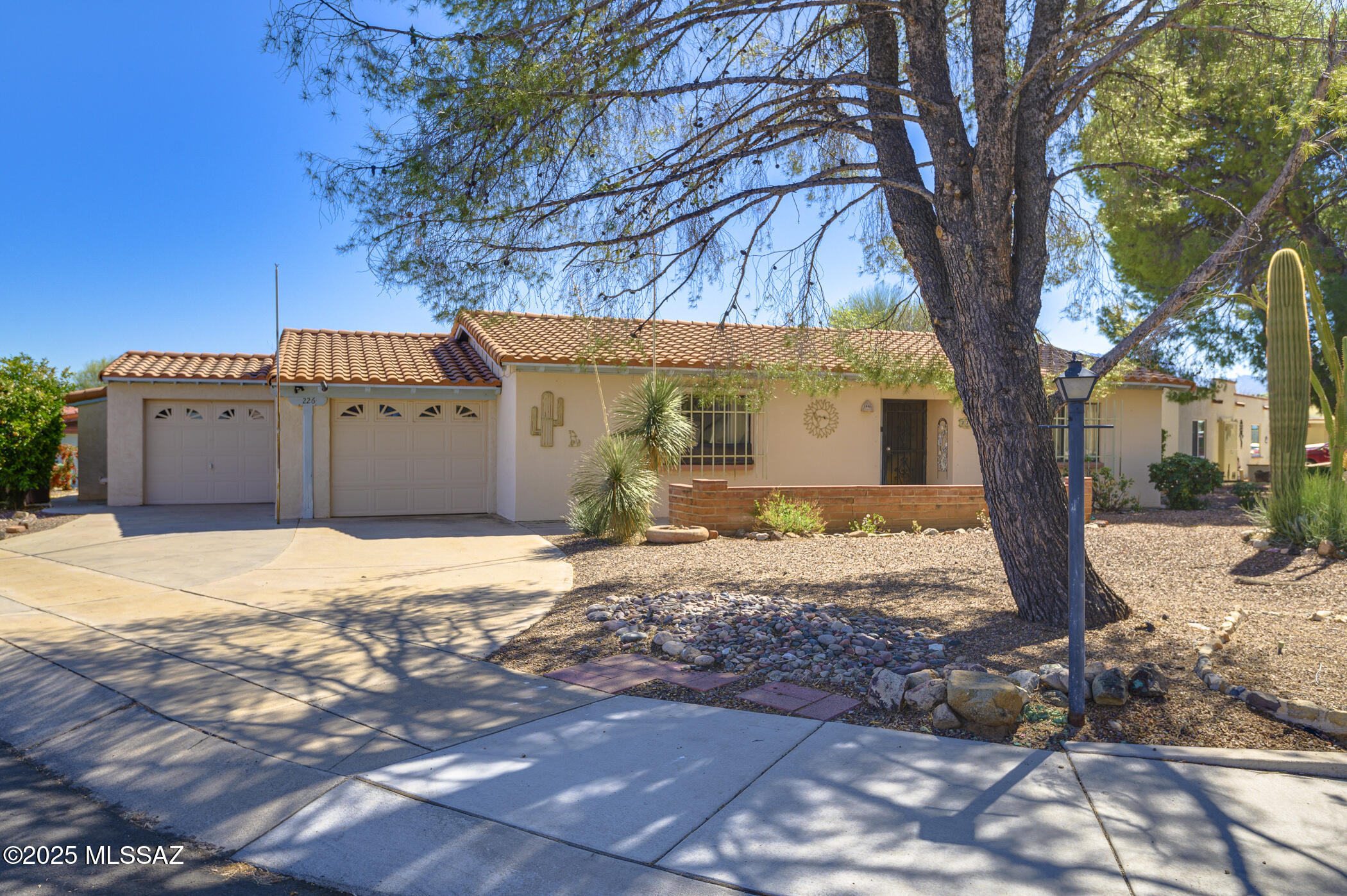 Surrounded by Haven Golf Course lies this hidden gem, Fairways 2. Here you'll find this traditional Southwest home, stucco finish, teal accent trim adorned with a Saltillo tile roof. This Mexican influence continues inside where ceramic tile dominates the flooring, kitchen counters, raised dual-sink vanity and remodeled walk-in shower in the primary bath. A family room off the kitchen increases the living space to over 1800sf. Another substantial improvement is the addition of a large walk-in closet in the owner's suite. Strategically placed skylights and solar domes illuminate the interior while newer dual-pane windows, in conjunction with a 2016 HVAC unit, reduce utility bills. This attractive asking price does reflect the need for repairs and beautification. Please tour this home and consider submitting an As-Is offer.