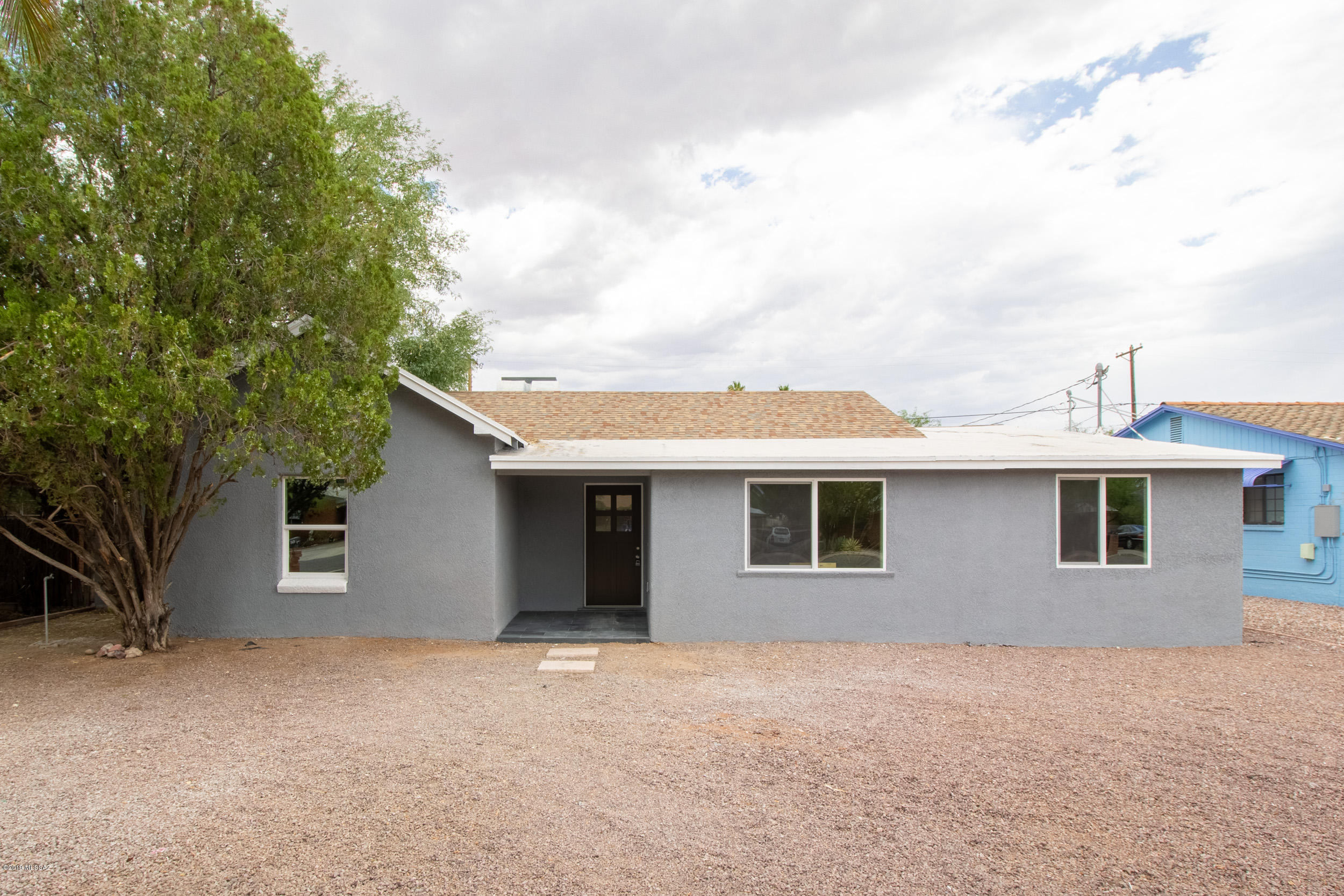 ***** OPEN HOUSE 7/21/19  11-2 PM ******
Beautifully remodeled HUGE home with 5 bedrooms (2 master suites!) 3 full bathrooms and MASSIVE entertainment/TV/additional bedroom/bonus room. Over 3,000 sq ft of livable space on .19 acre. This unique home is the perfect setting for a large/multi-generational family, assisted living center or anyone who just enjoys lots of space! Contemporary upgrades include gorgeous wood-look tile flooring, granite countertops with raised bartop, new cabinetry, stainless steel appliances and ample pantry space. Large laundry room with sink and additional storage space. New windows, doors, fixtures, mini split systems in back two rooms, fresh interior and exterior paint. Close to shopping, dining and entertainment. Go show today!