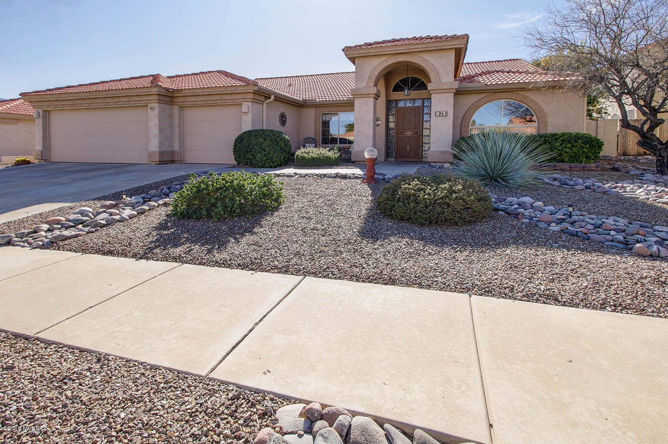 Rare find with this IMMACULATE move in ready, single story, 3 car garage, 4 bedroom/2 bath home w/ pool on a cul-de-sac street.  Sellers are original owners & cared for this home from day one!  Upon entering is area for formal living/dining room as well as den/office w/ beautiful french doors.  Kitchen has gorgeous granite countertops, breakfast bar, drop down lighting, SS appliances, walk-in pantry, lots of cabinets/counter space and eat-in area.   Opens to great room w/ beehive FP.  Wood sliders open to backyard w/ expansive covered patio, ramada & pebble tec pool!  Good size master bdrm w/ door leading to backyard, bath w/ garden tub & separate shower, walk in closet. Tile thru out entire home, wood blinds, ceiling fans, vaulted ceilings, dual heating & more! POLY-PIPE REPLACED!