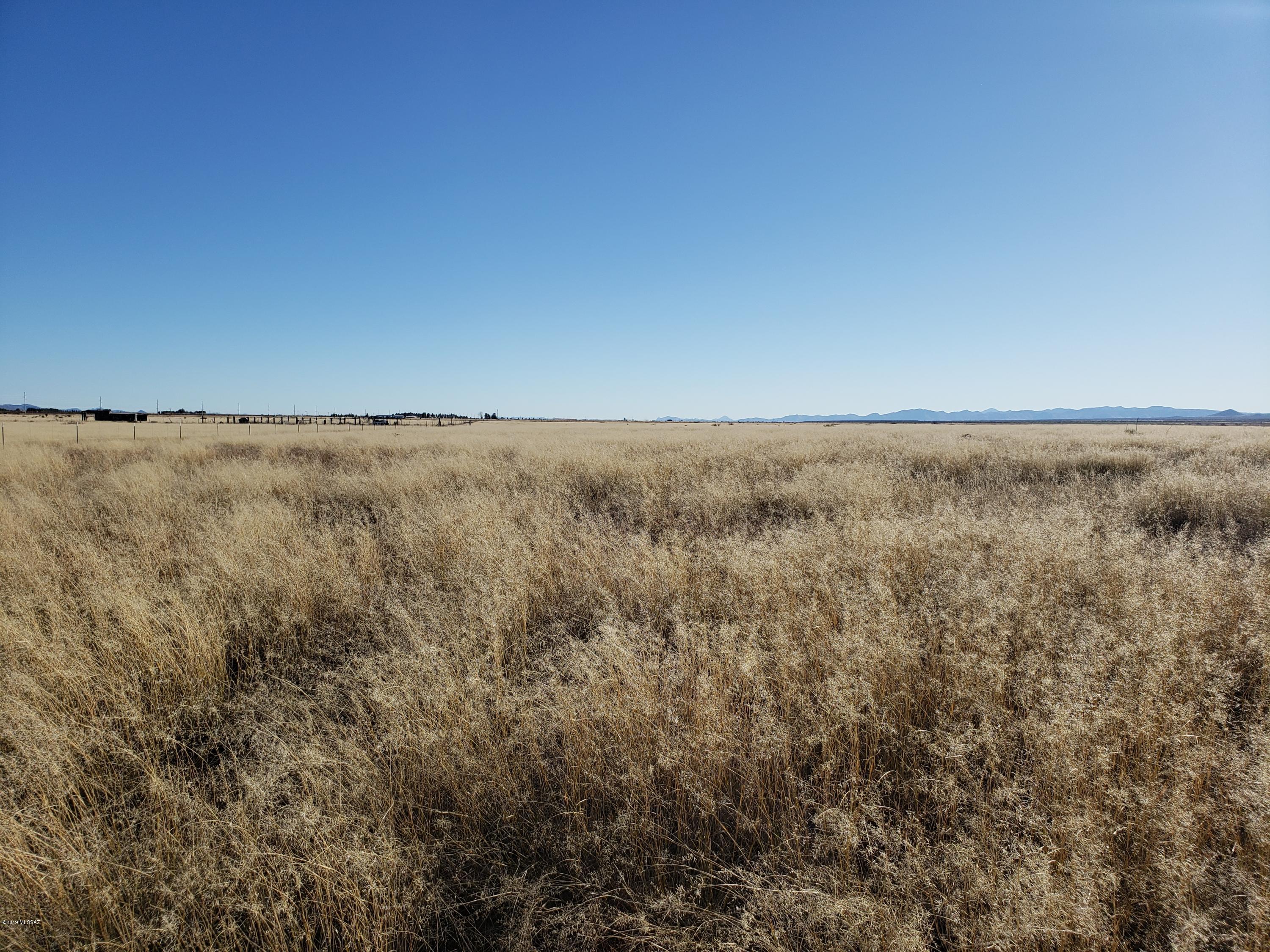 Absolutely Gorgeous Location to Build a Dream Home.  Directly across from State Trust Land.  Flat - 100% useable.  Open fields around yo. 1/4 mile off of the Paved Hwy 191.  
Includes 2 parcels - 401-10-080E & 401-10-080K