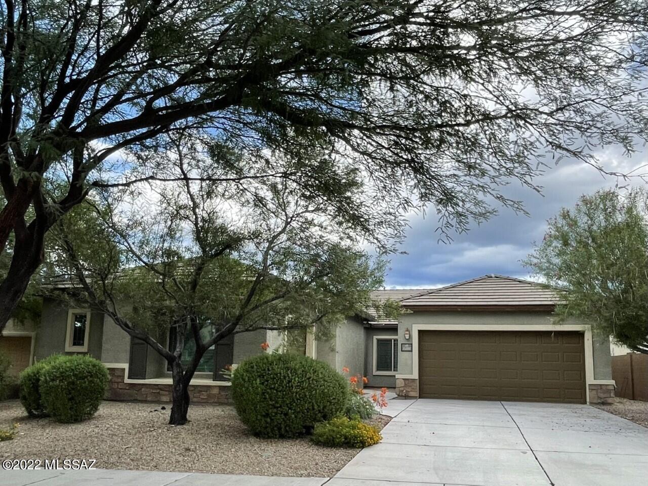 Beautifully upgraded and lightly lived in, this home offers a rare opportunity to own a property that backs to acres of community owned open land. 9 foot ceilings and 8 foot solid core doors give the feeling of a custom home.  Extensive use of tile, upgraded cabinets, KitchenAid appliances. The master has a bay window, coffered ceilings, expanded master shower and 2 walk in closets.  See floor plan in photos and documents.

Sierra Morado neighborhood offers many parks scattered throughout the subdivision, (one just steps away from this home), a dog park, community pool, basketball courts, club house and miles of walking/biking trails.