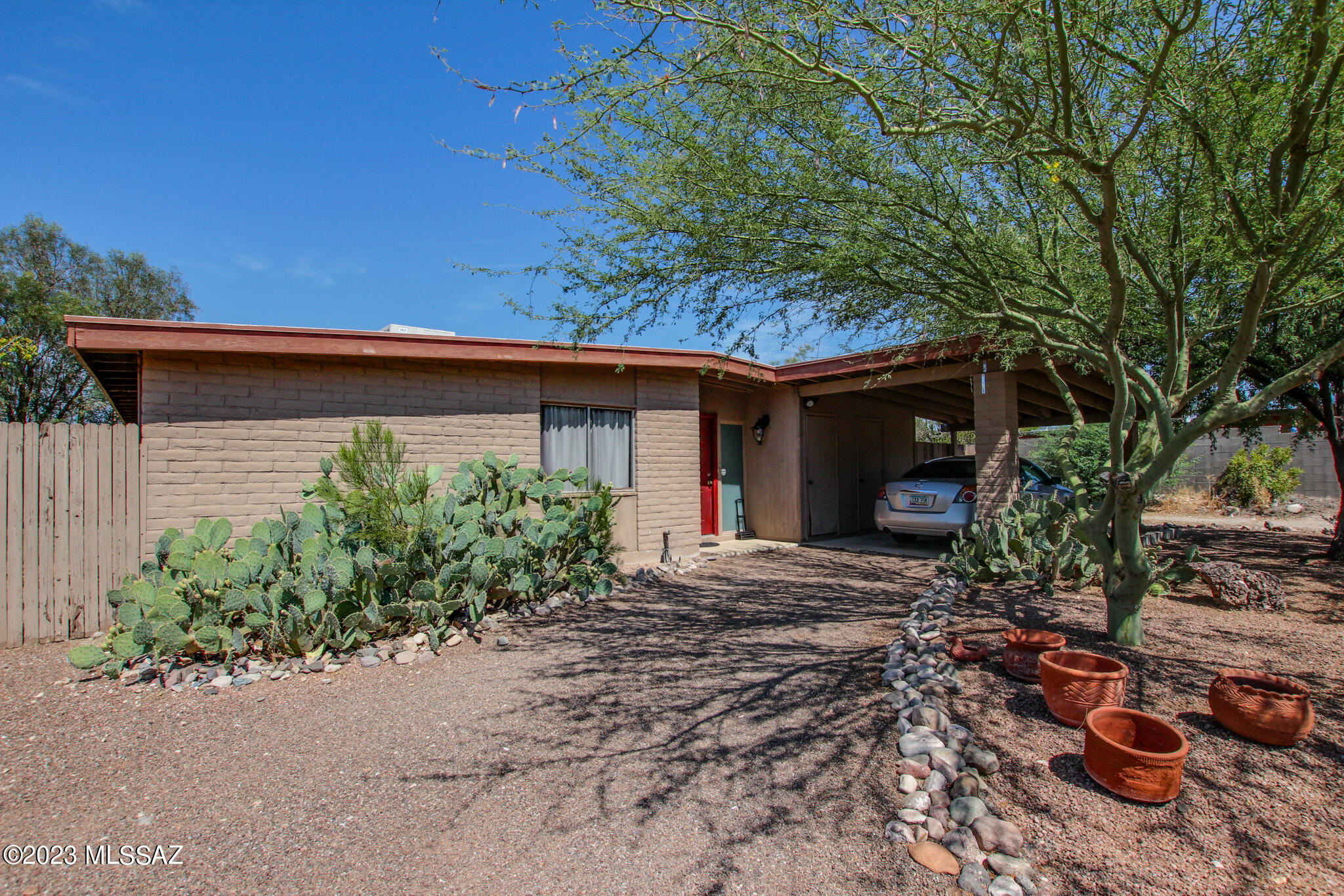 Clean 3 bed 2 bath move in ready home with a pool!  Large kitchen with SS appliances overlooking the pool.  Perfect for entertaining. Big backyard with workshop.  Come make this home yours.  Fantastic location!